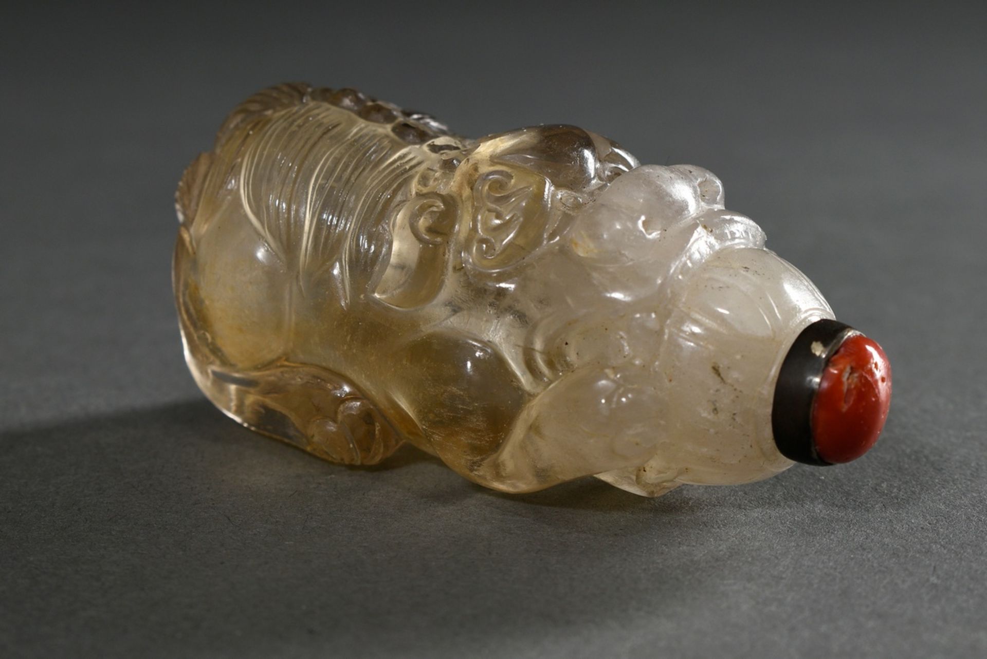 Fine sculpted rock crystal snuff bottle "Fo lion with ball in mouth", stopper with coral cabochon, 