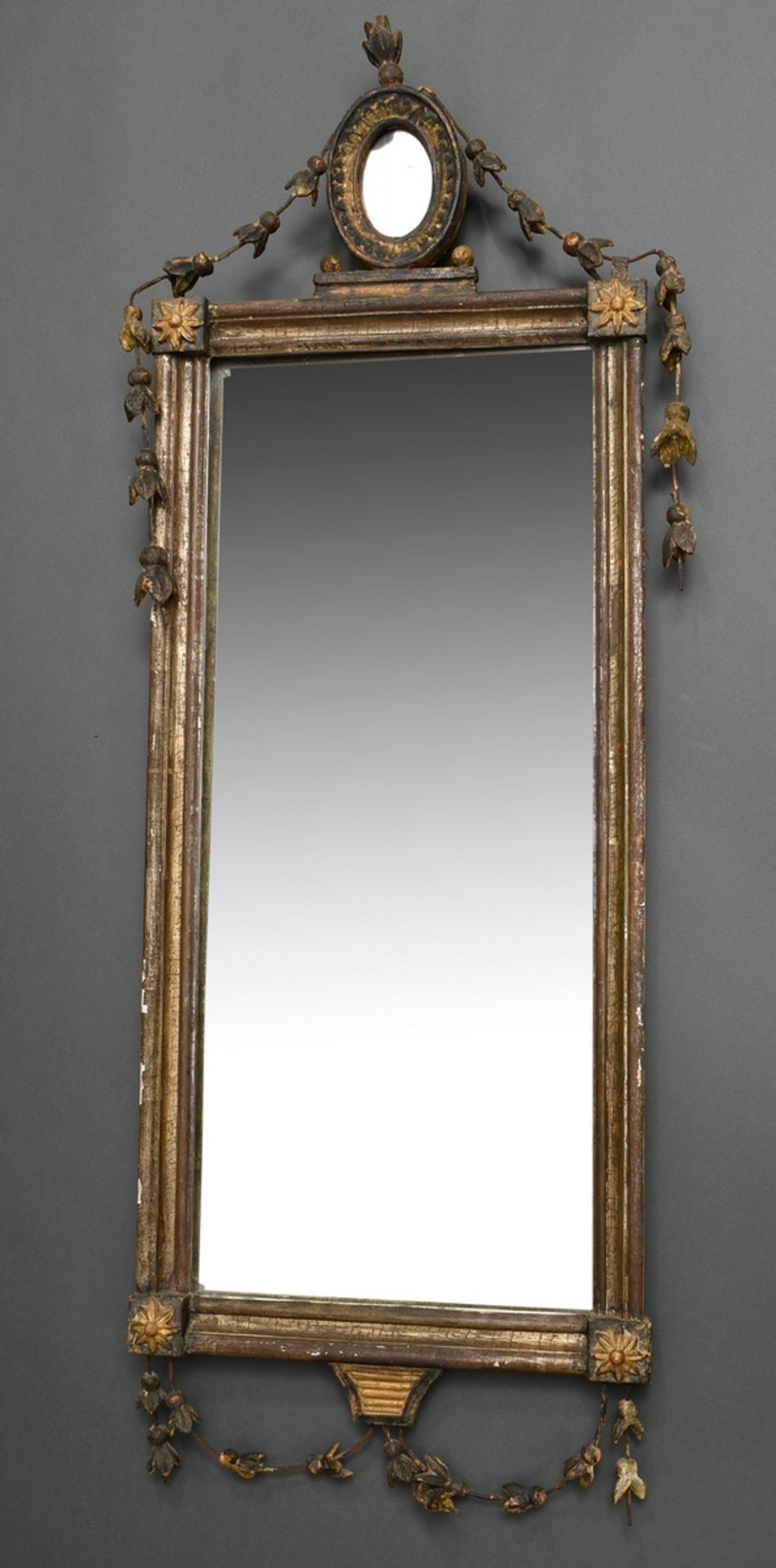 Gilded classicistic console mirror with filigree floral festoons and rosette frame as crowning, old