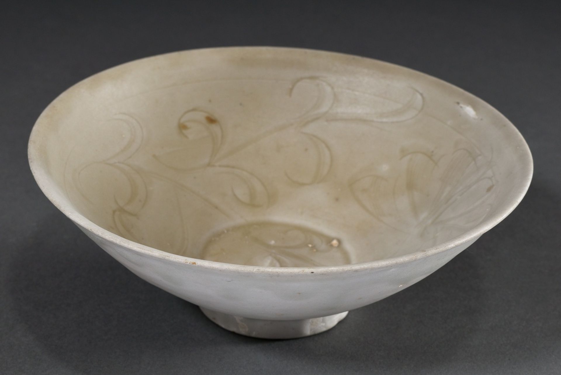 Chinese porcelain bowl with floral incised decoration and light celadon glaze, probably shipwreck f