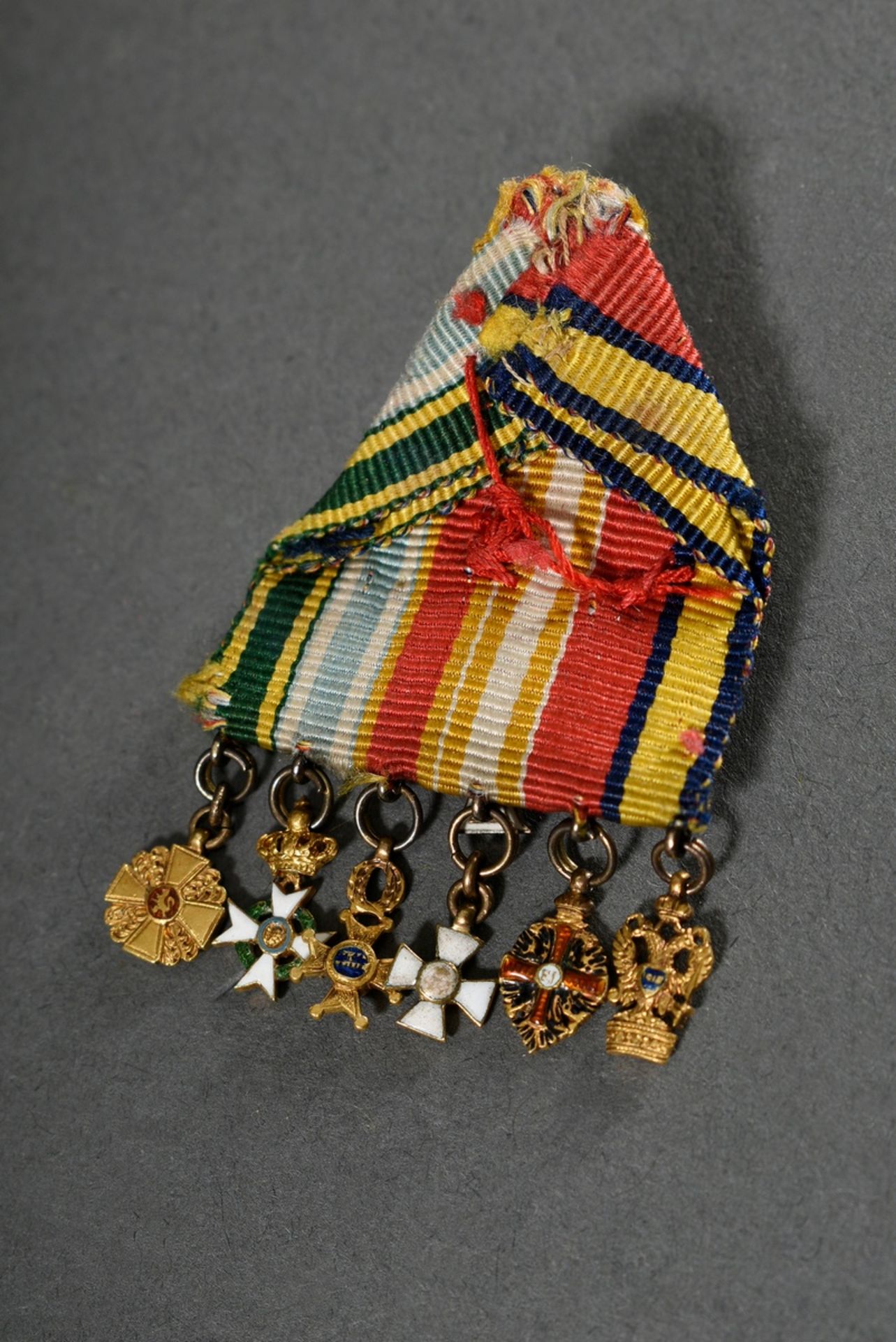 Fragment of a ribbon buckle with 7 miniatures of orders in especially small design, 19th century: R - Image 2 of 3