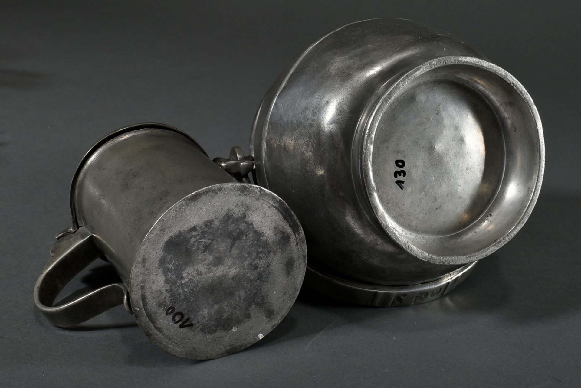 2 Various pieces of Wismar pewter: large hanging pot with figural handles (food carriers) and engra - Image 7 of 11