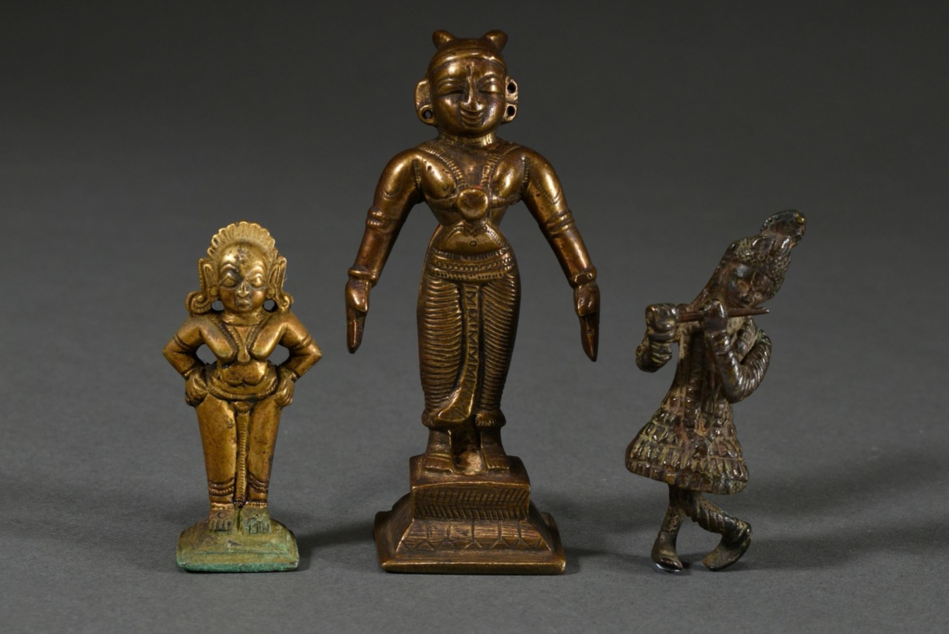 3 Various bronzes: "Radha, female deity and Krishna Venugupola playing the flute", partly fire-gild