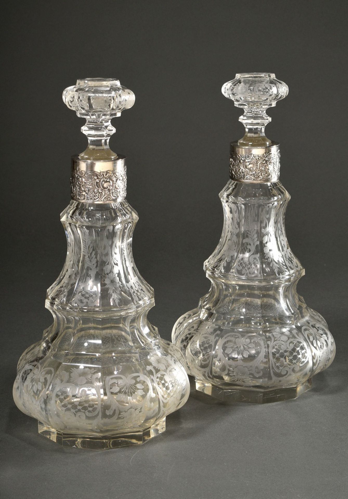 Pair of opulent crystal carafes in faceted baluster form with floral ornamental cut and silver 800  - Image 2 of 7