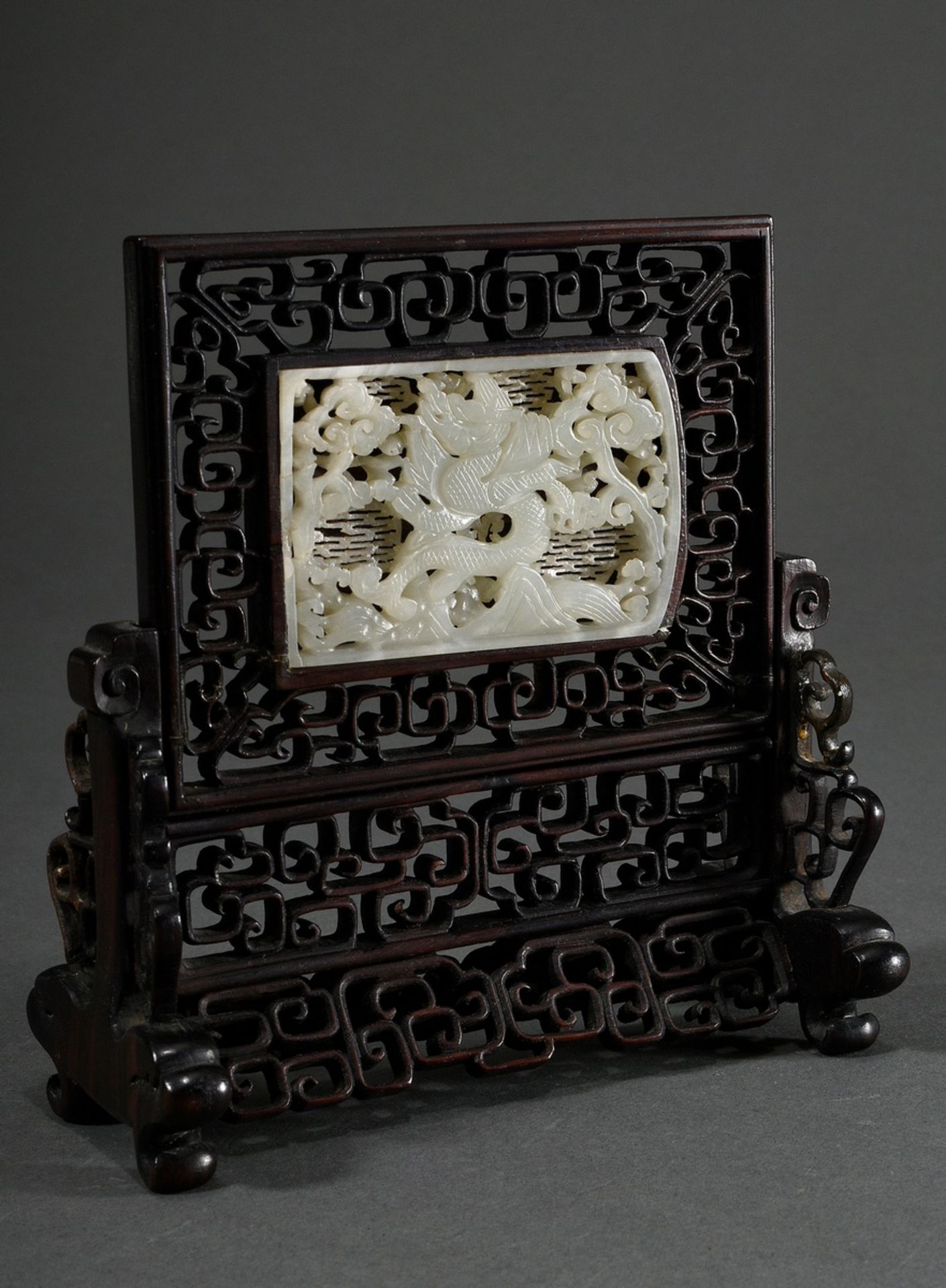Miniature rosewood table stand, filigree openwork, with inset jade plaque "Dragon above mountains a