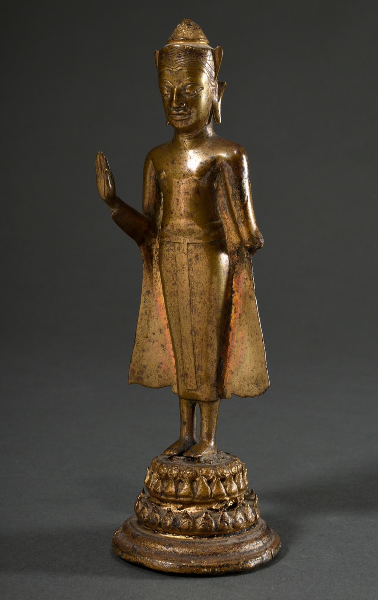 Brass figure "Standing Buddha on a lotus base" in Ayutthaya style, Thailand 16th/17th century, h. 2
