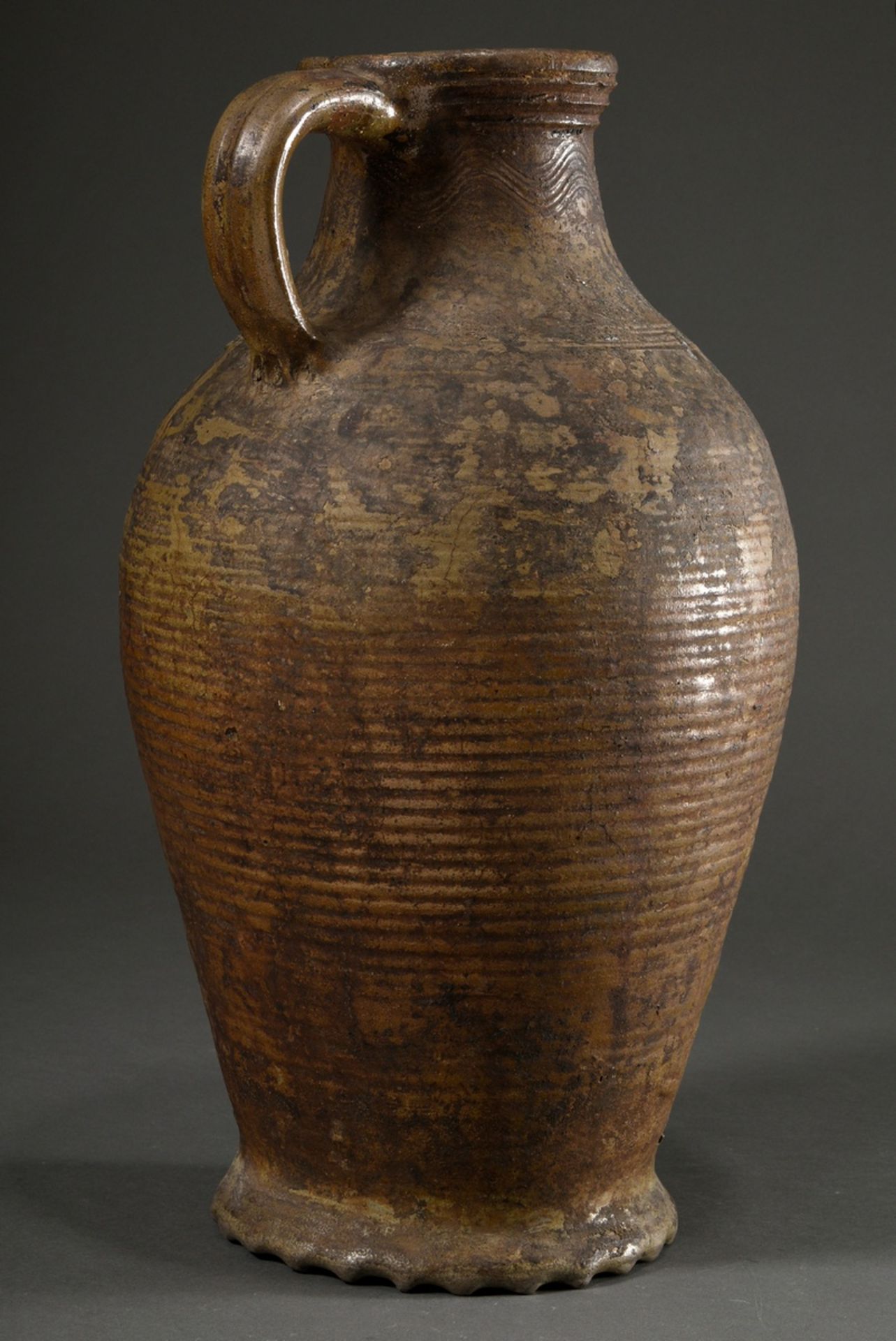 A large Pötzkanne or Bartmann jug with remnants of light brown salt glaze and "Bartmann mask" decor - Image 6 of 12