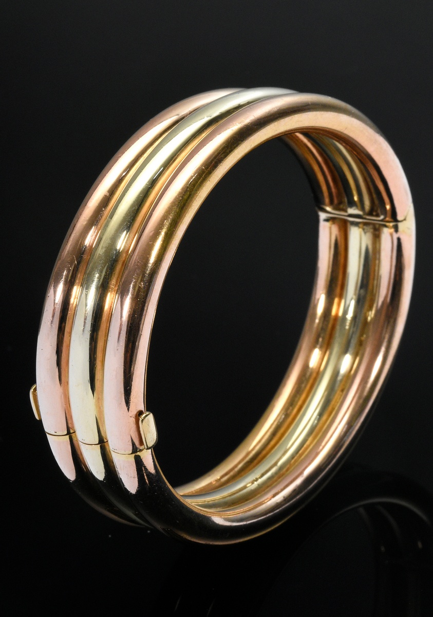 Oval bicolour gold 750 bangle with hinge, 65g, inside 6x5cm, traces of wear