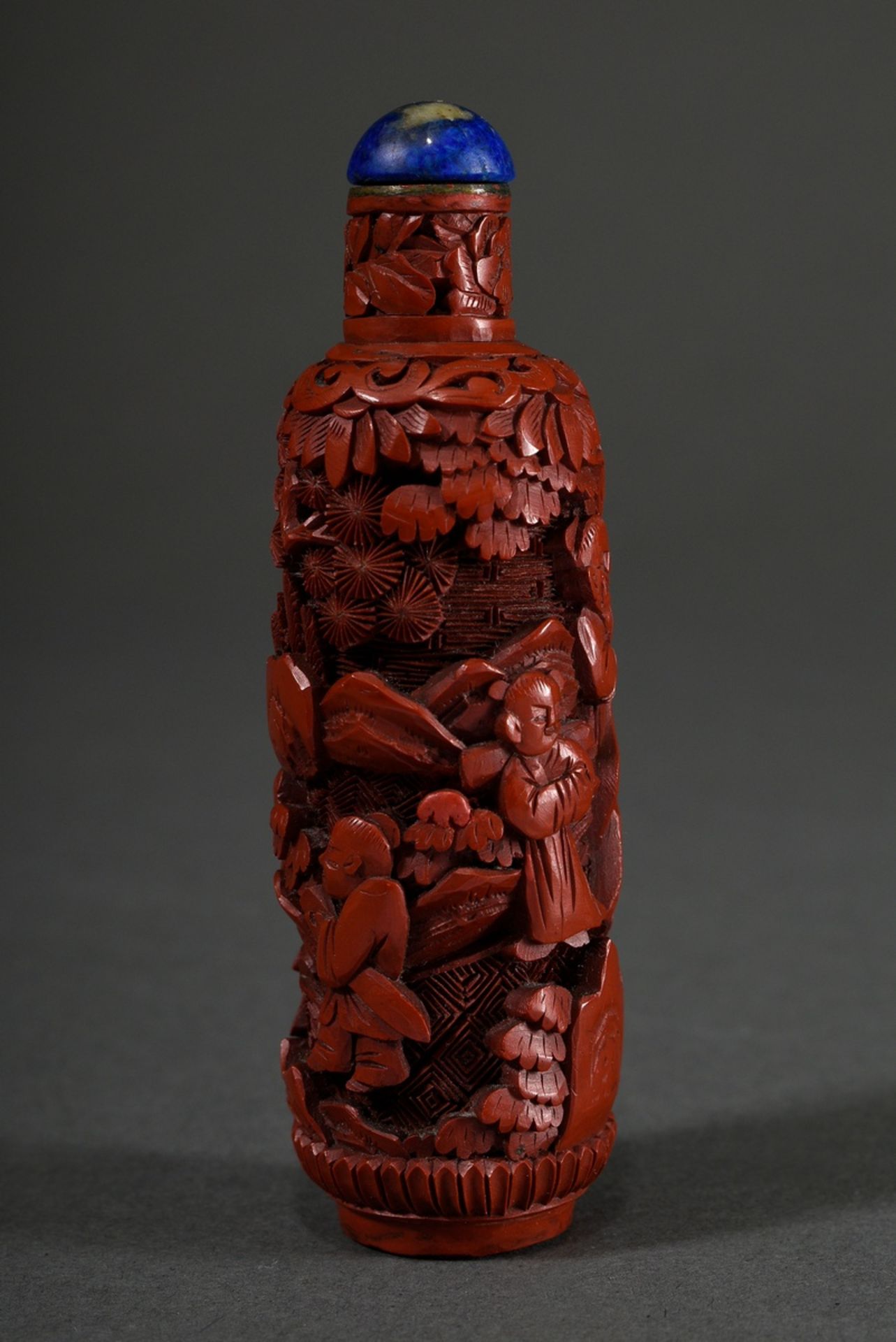 Red carved lacquer snuff-bottle "Scholars with pupils in a wooded mountain landscape", finely execu
