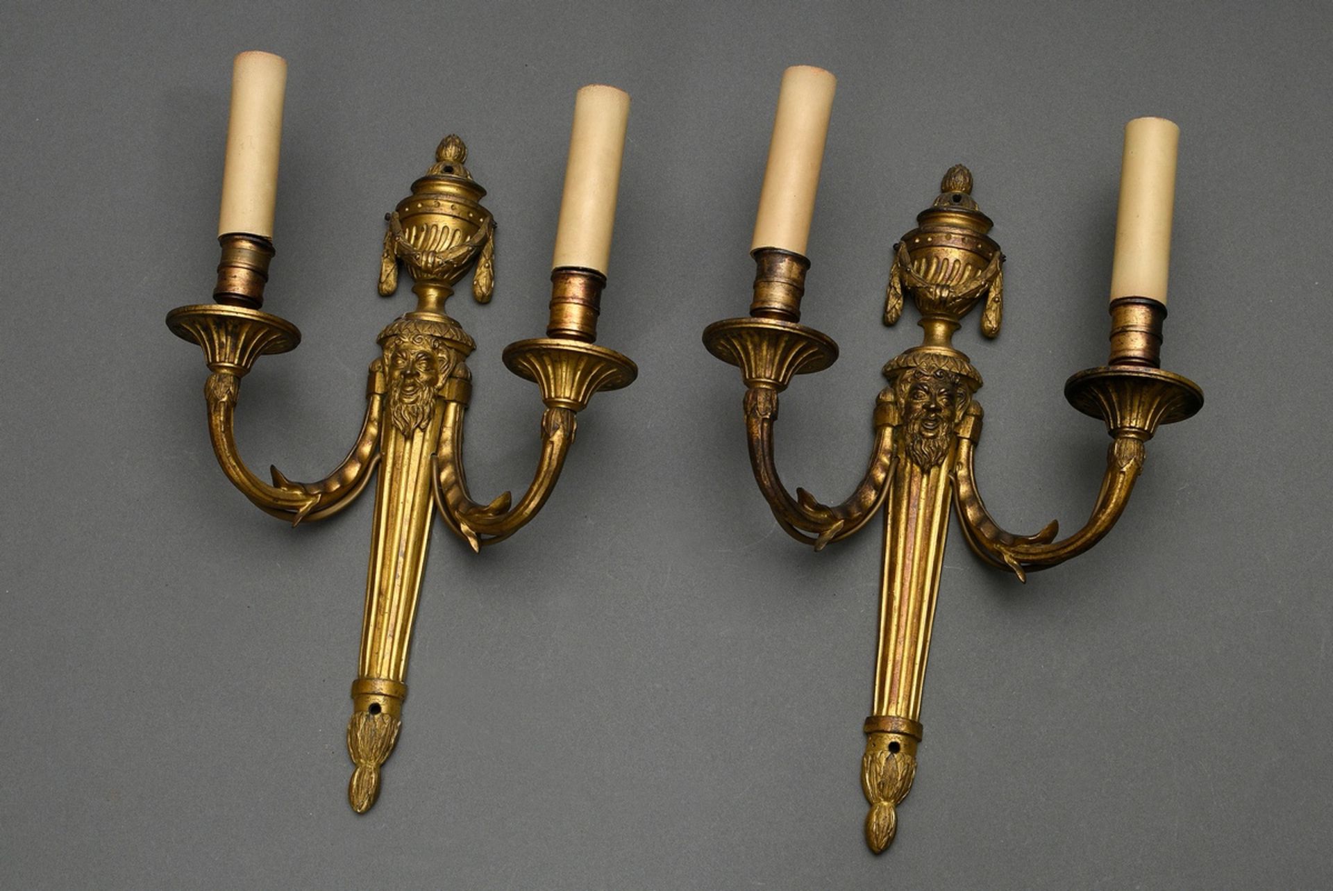 Pair of fine fire-gilt bronze wall arms in Louis XVI style with sculptural mascarons and vases crow