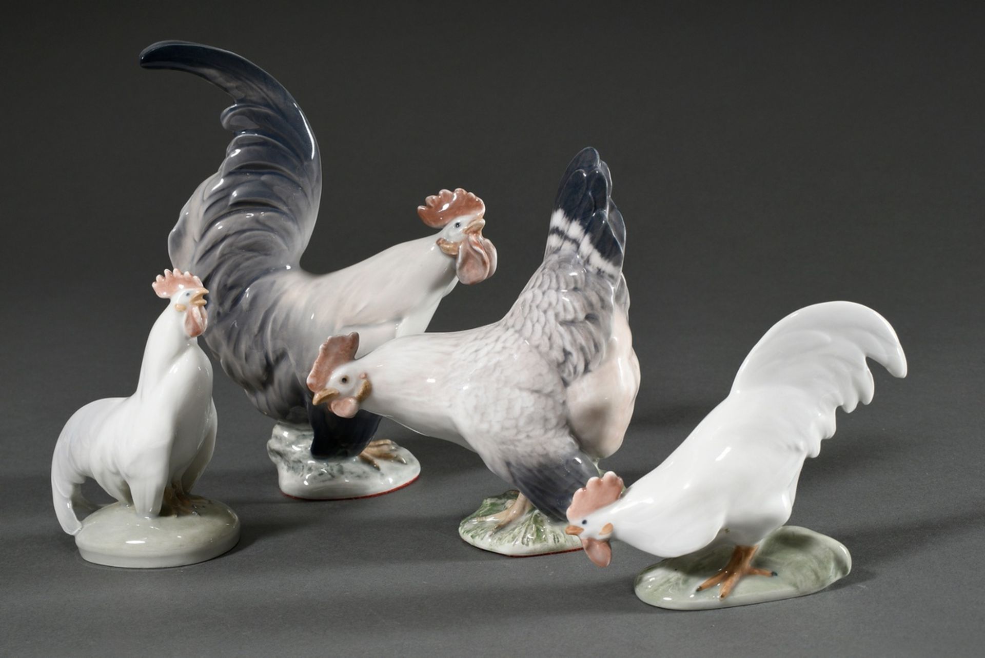 4 Various Royal Copenhagen figurines "Chickens" with polychrome underglaze painting, model no. 1024