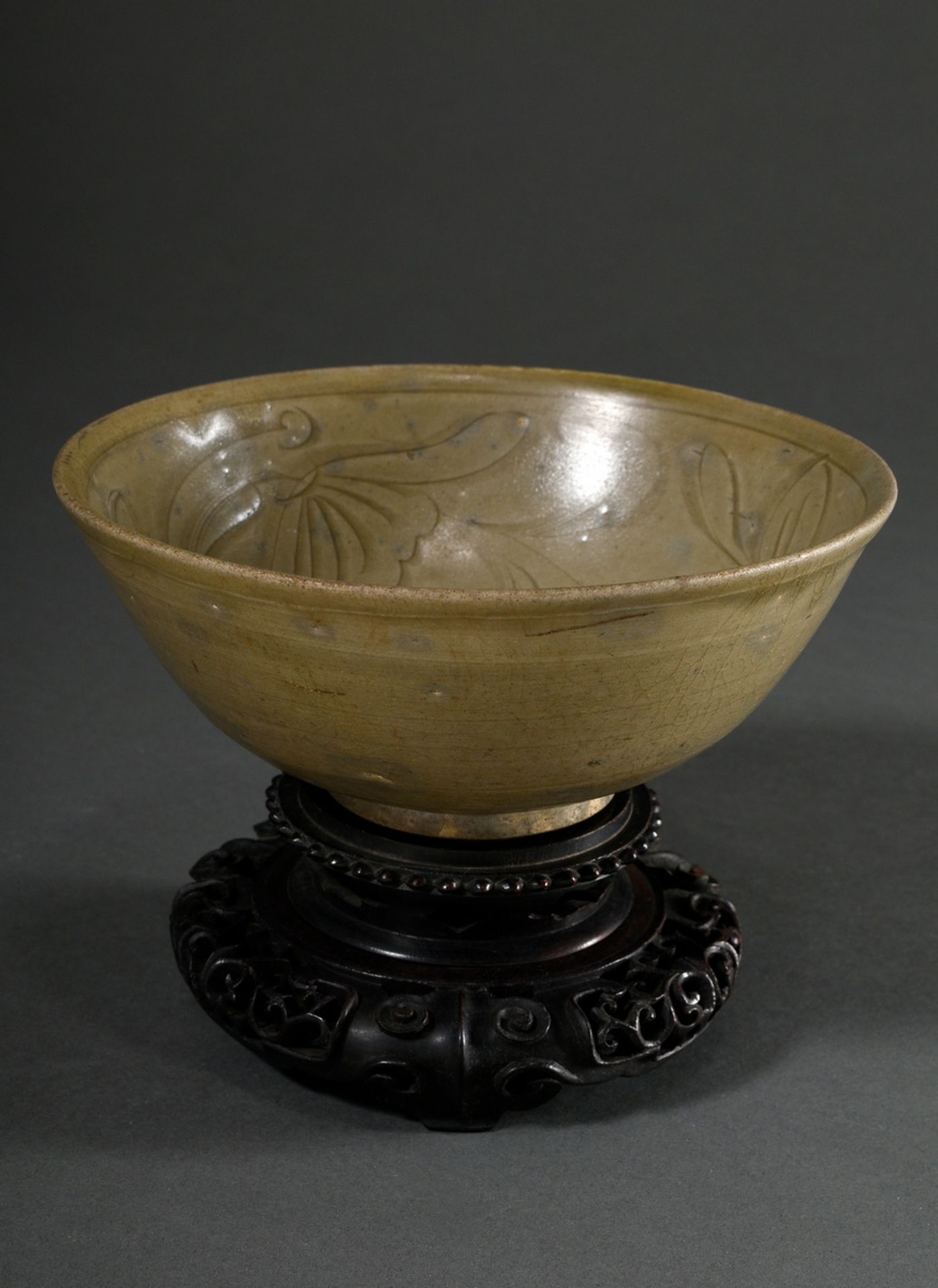 Longquan celadon bowl with floral Anhua incised decoration, China probably Yuan/Ming dynasty, on a 