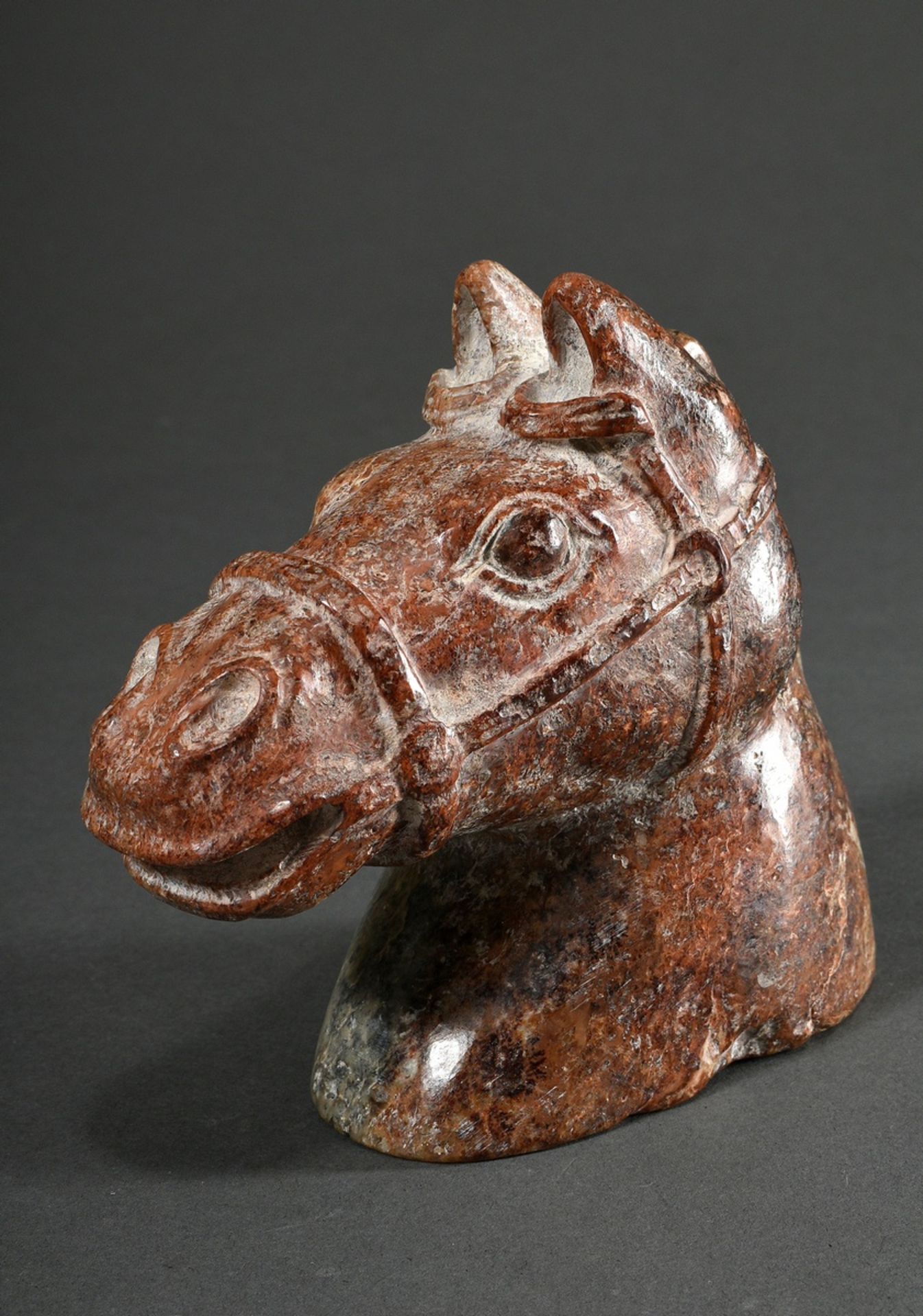 Jade "horse head", bridled and with trimmed mane, in the style of the Han dynasty, partially calcif