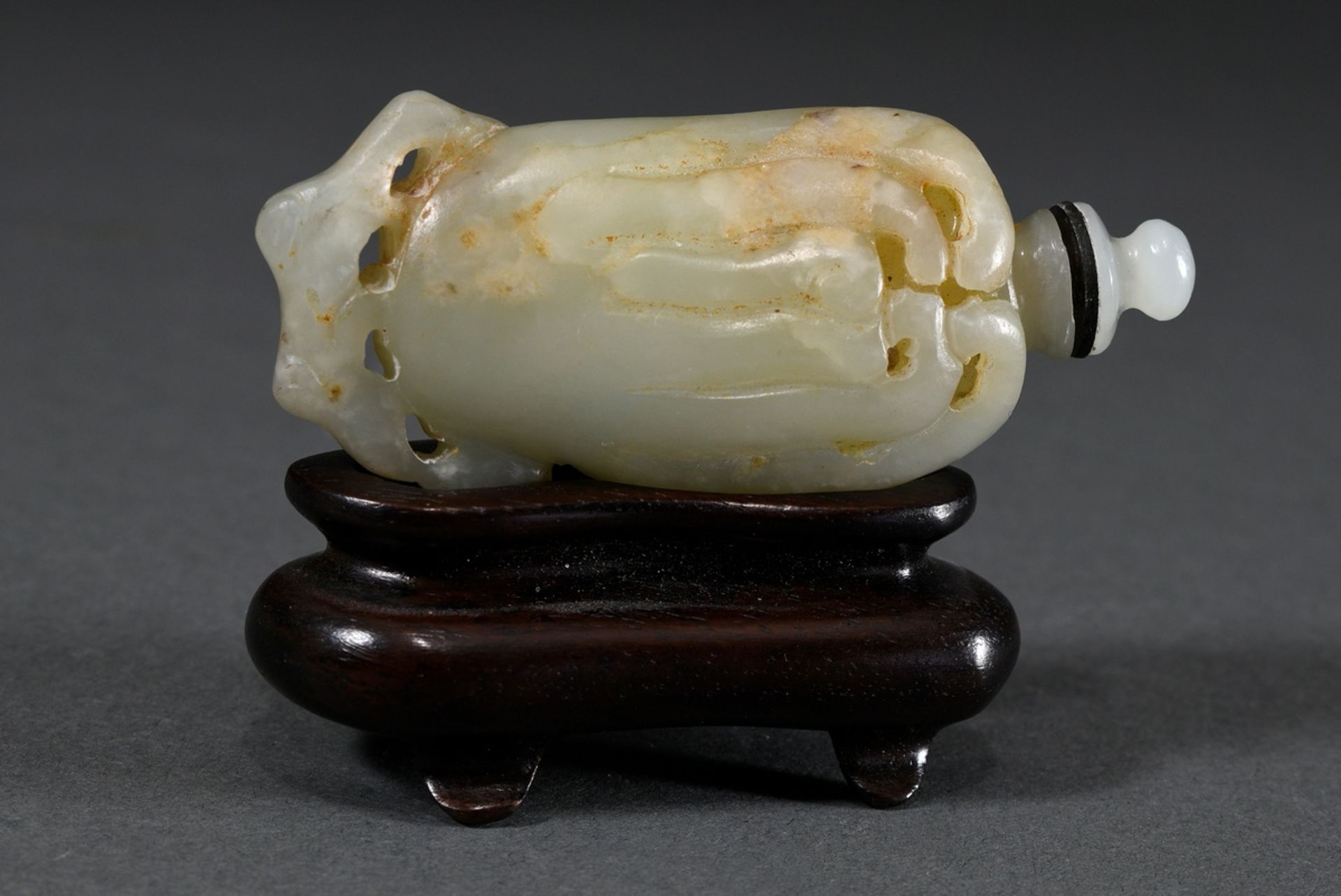 Light celadon jade snuffbottle "Buddhahand lemon", thin-walled hollowed, China Qing dynasty, on a l