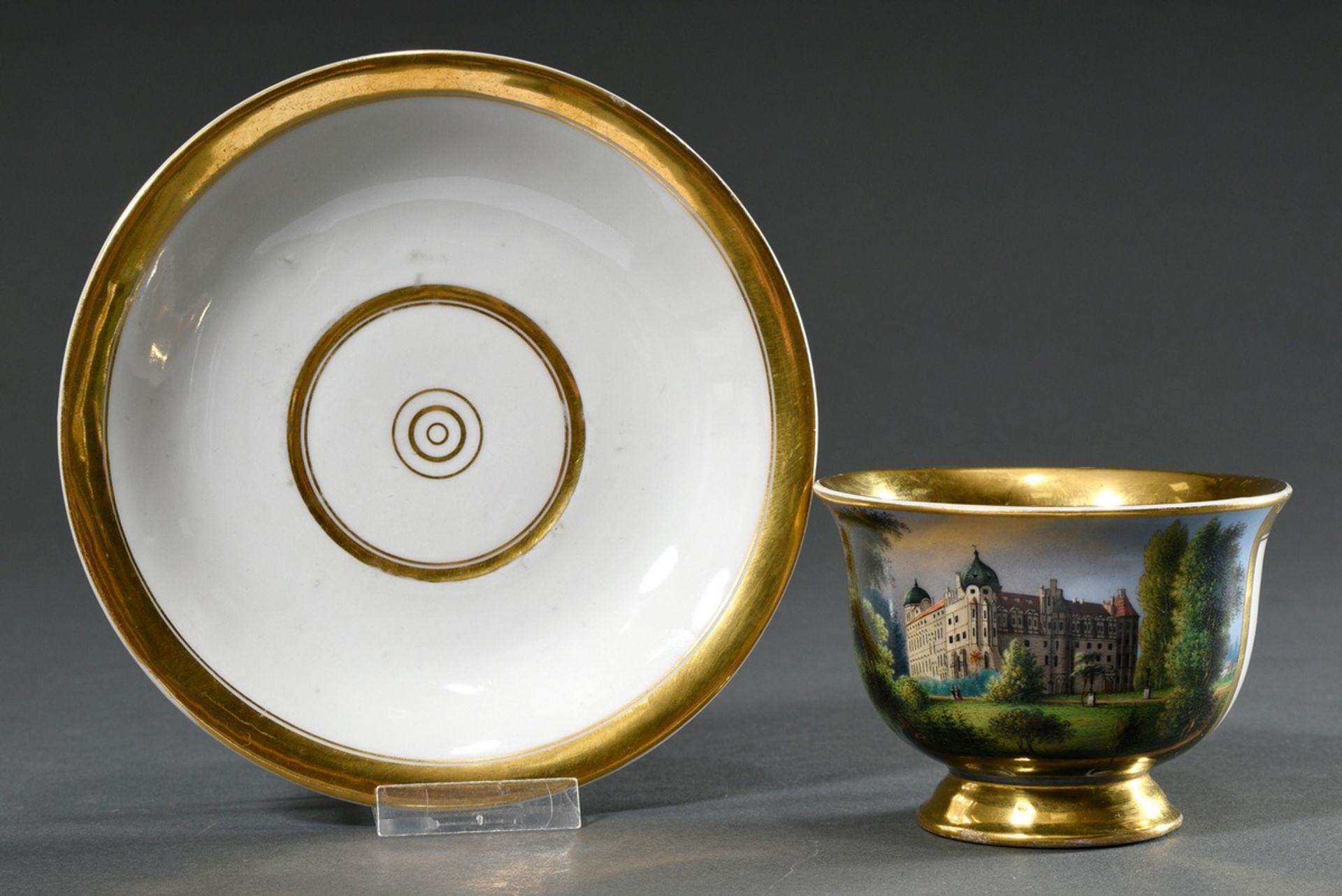 Fürstenberg view cup/saucer with flawless painting "Celle Castle" and wide gold rim, 19th century, 