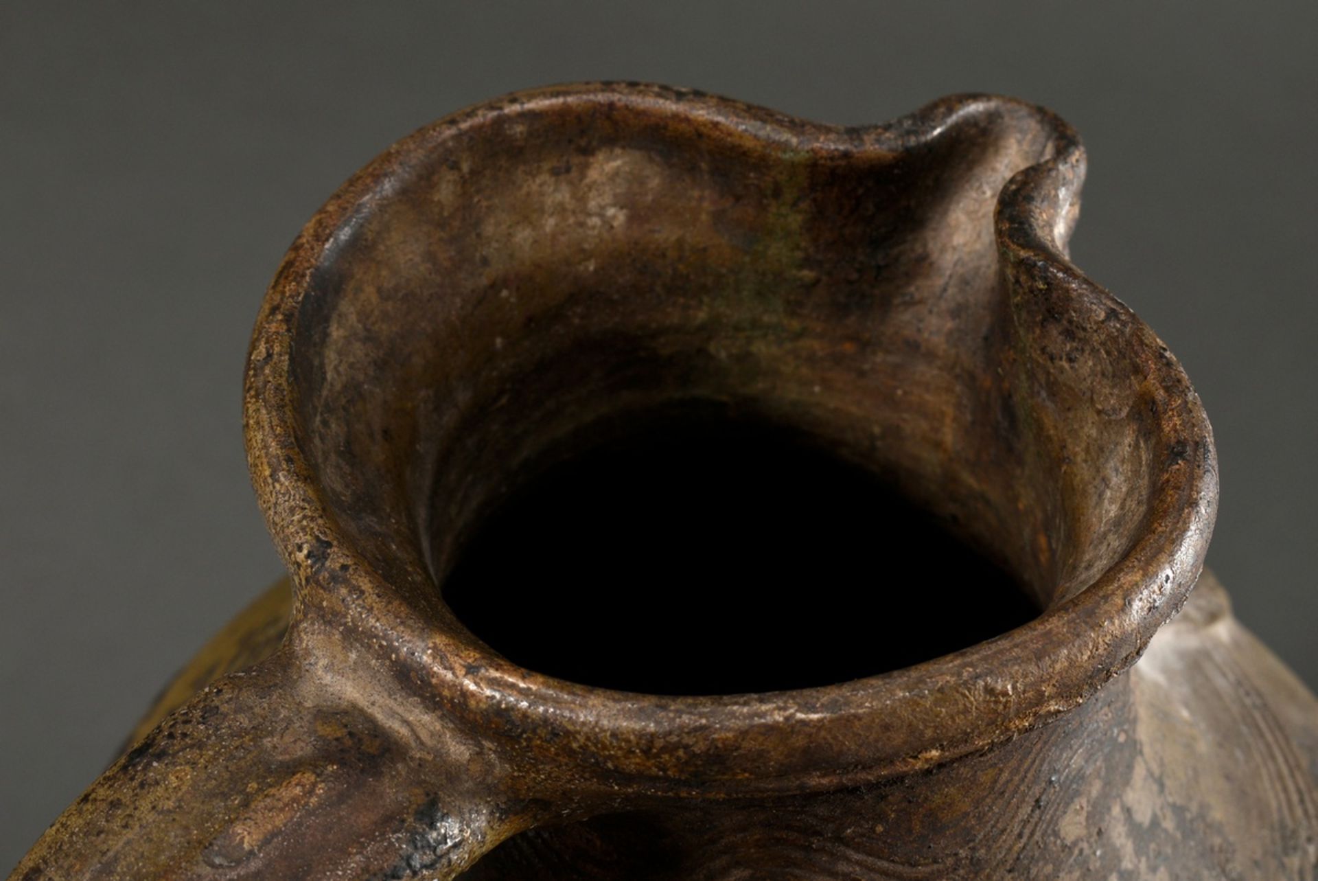 A large Pötzkanne or Bartmann jug with remnants of light brown salt glaze and "Bartmann mask" decor - Image 11 of 12