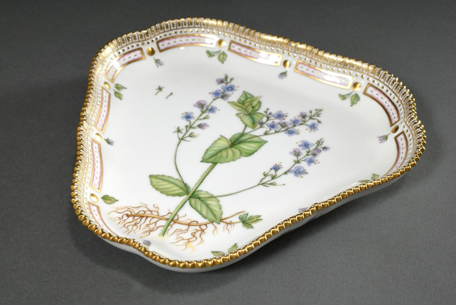 Small triangular Royal Copenhagen "Flora Danica" plate with polychrome painting in the mirror and g