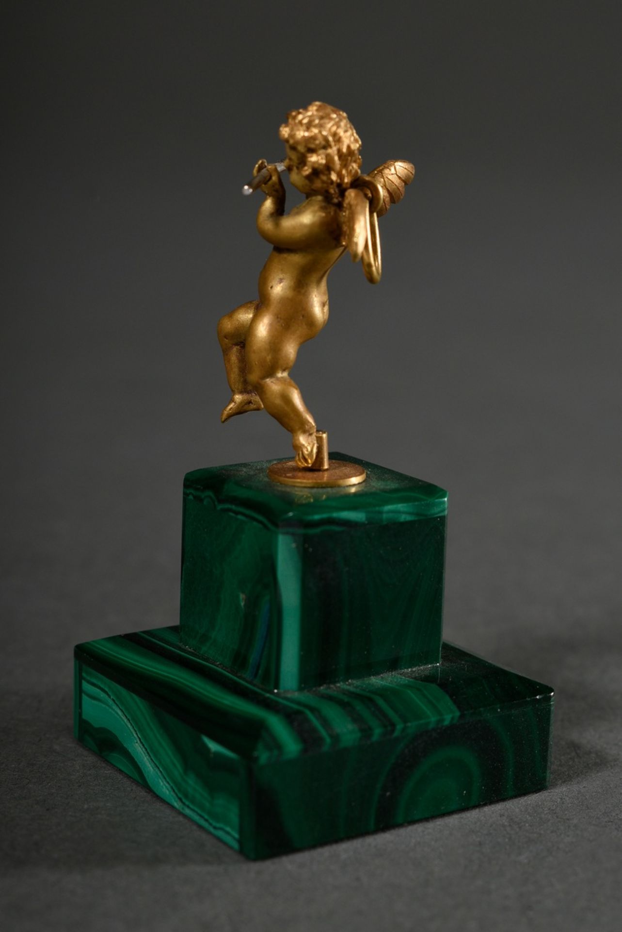 Yellow gold 750 miniature figure "Dancing Cupid with transverse flute" on eyelet on base covered wi - Image 3 of 6