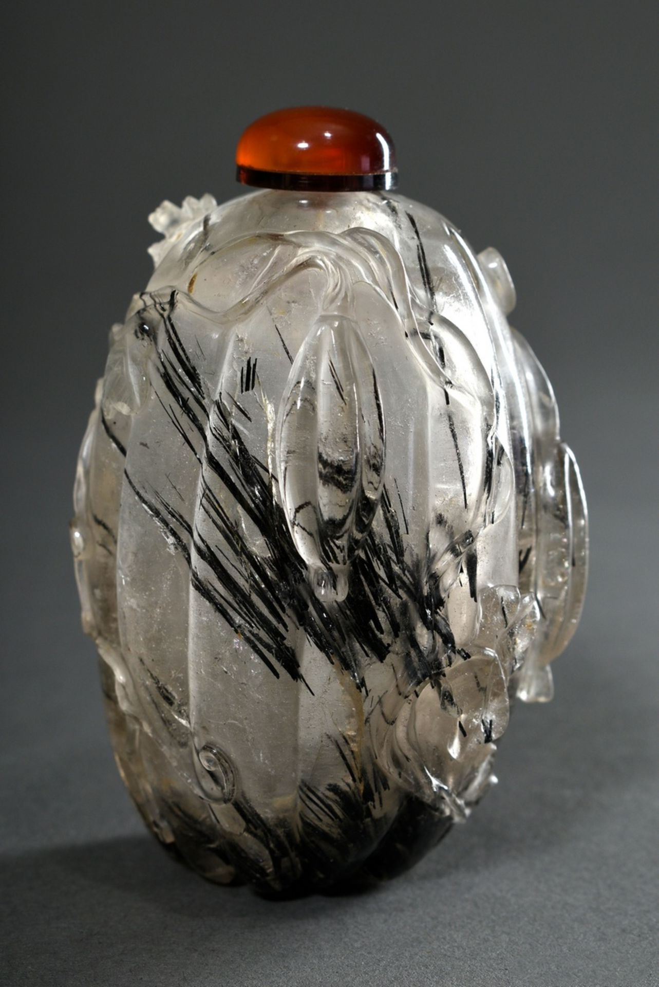 Exceptional rock crystal snuffbottle with rutile needles in gourd form with sculptural cut "blossom