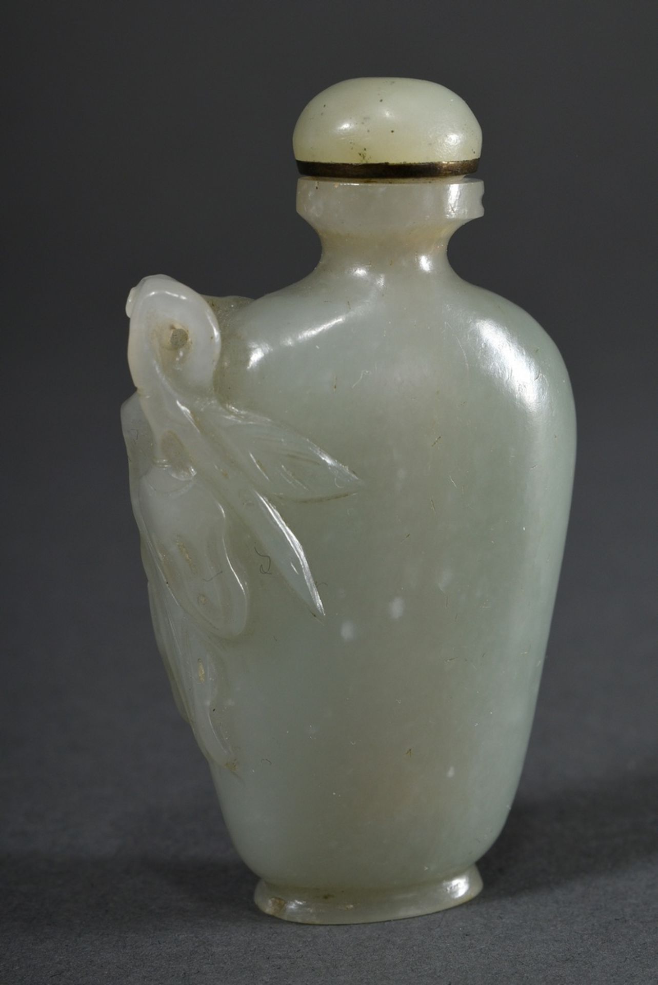 Seladon jade snuffbottle with "flower and leaf decoration" in high relief, China probably Qing dyna
