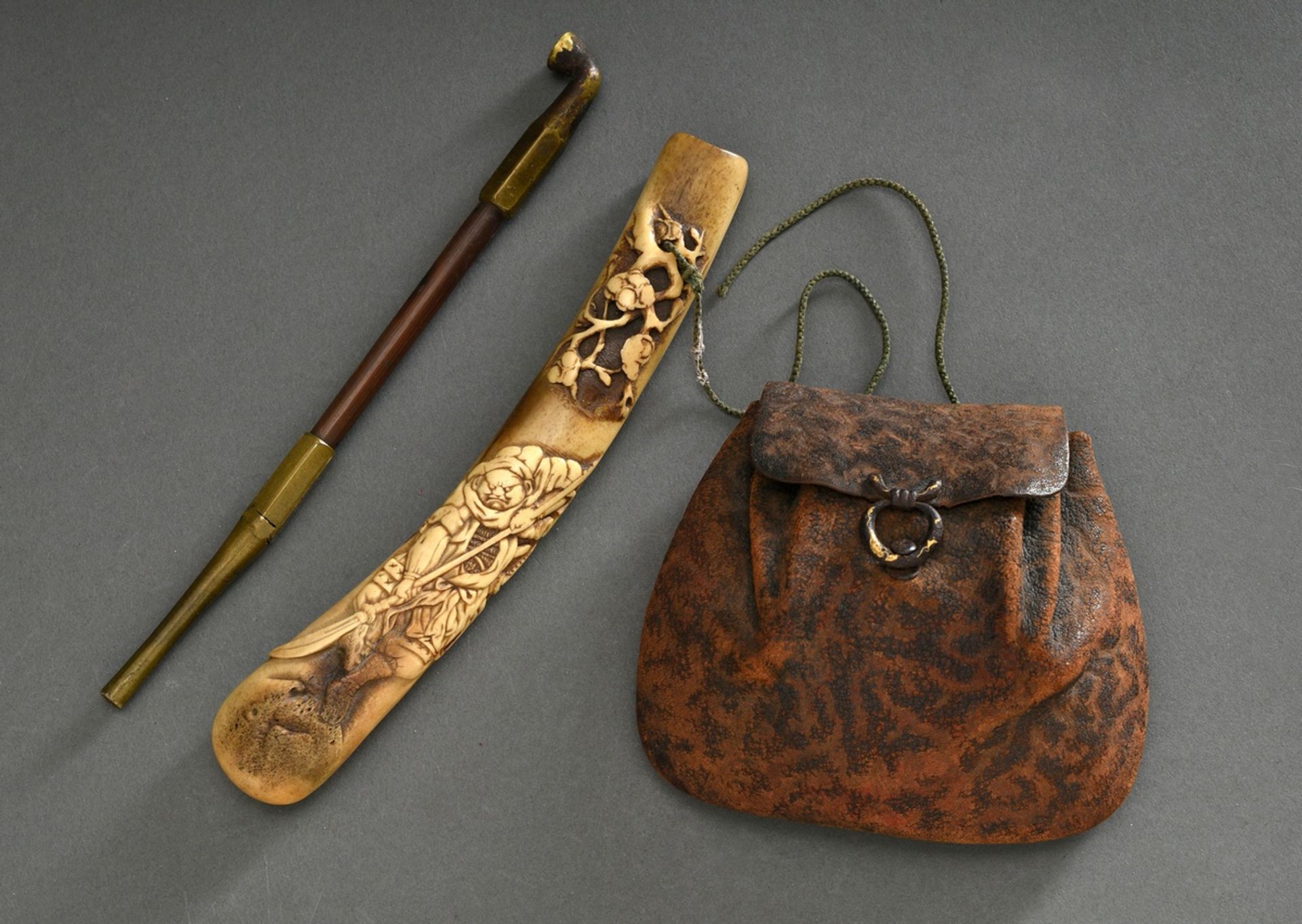 Stag's horn kiseruzutsu with relief carving "Samurai with lance under cherry branch" and leather ta