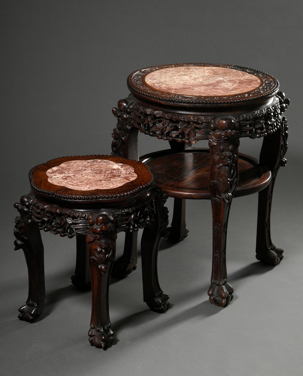 2 Various round redwood stools with richly carved frames and reddish marble tops, late 19th c., h. 
