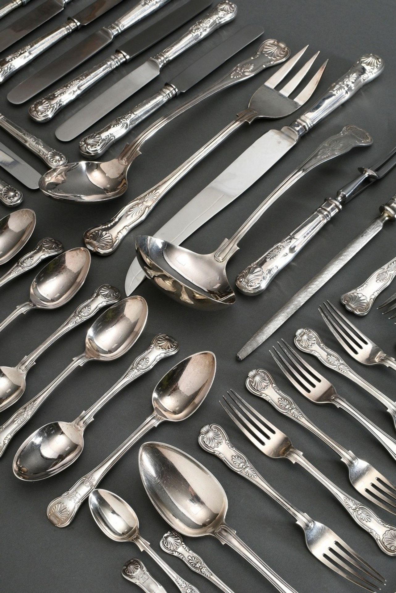 42 pieces of English cutlery "Kings Pattern" in different designs, partly with engraved family cres