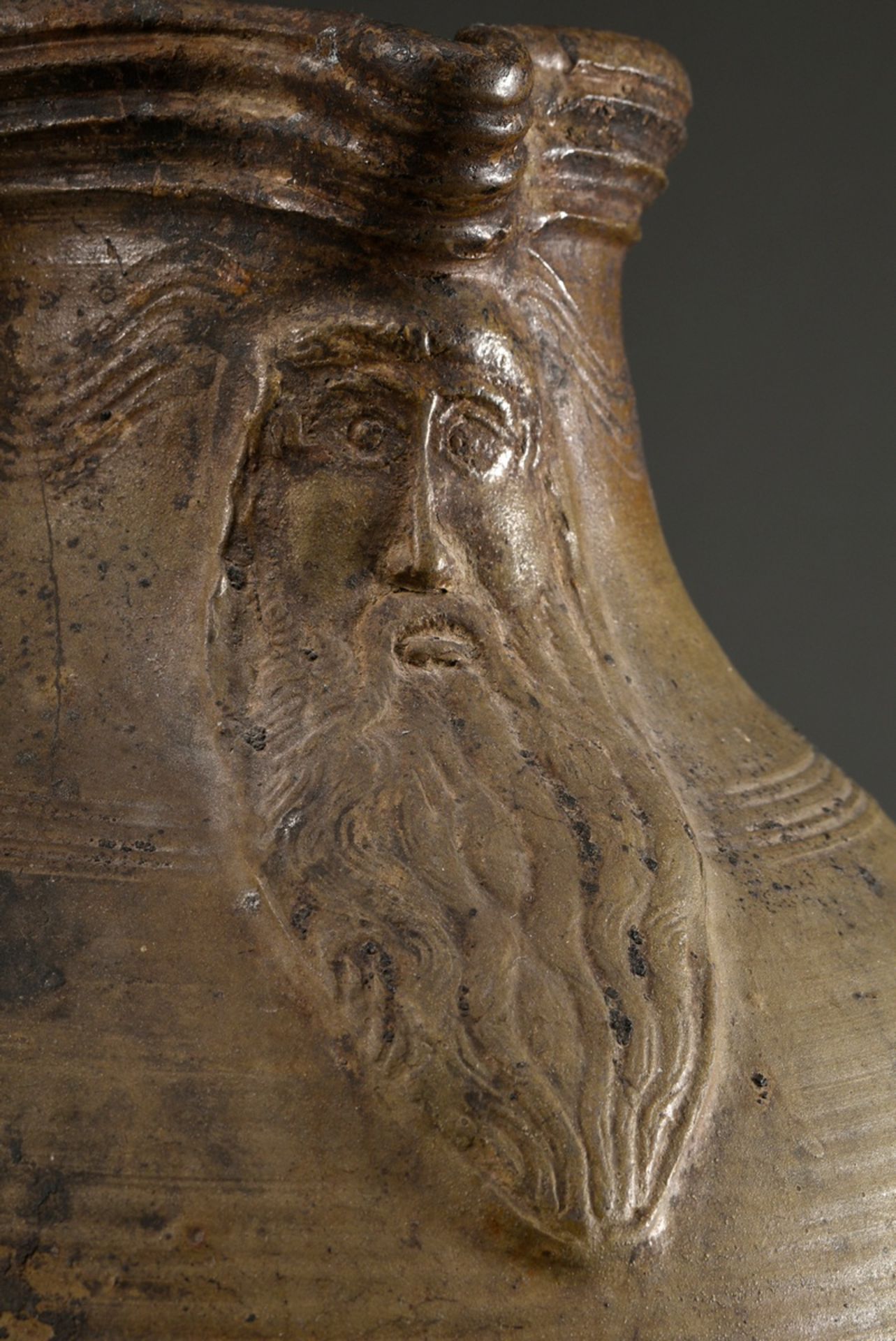 A large Pötzkanne or Bartmann jug with remnants of light brown salt glaze and "Bartmann mask" decor - Image 5 of 12