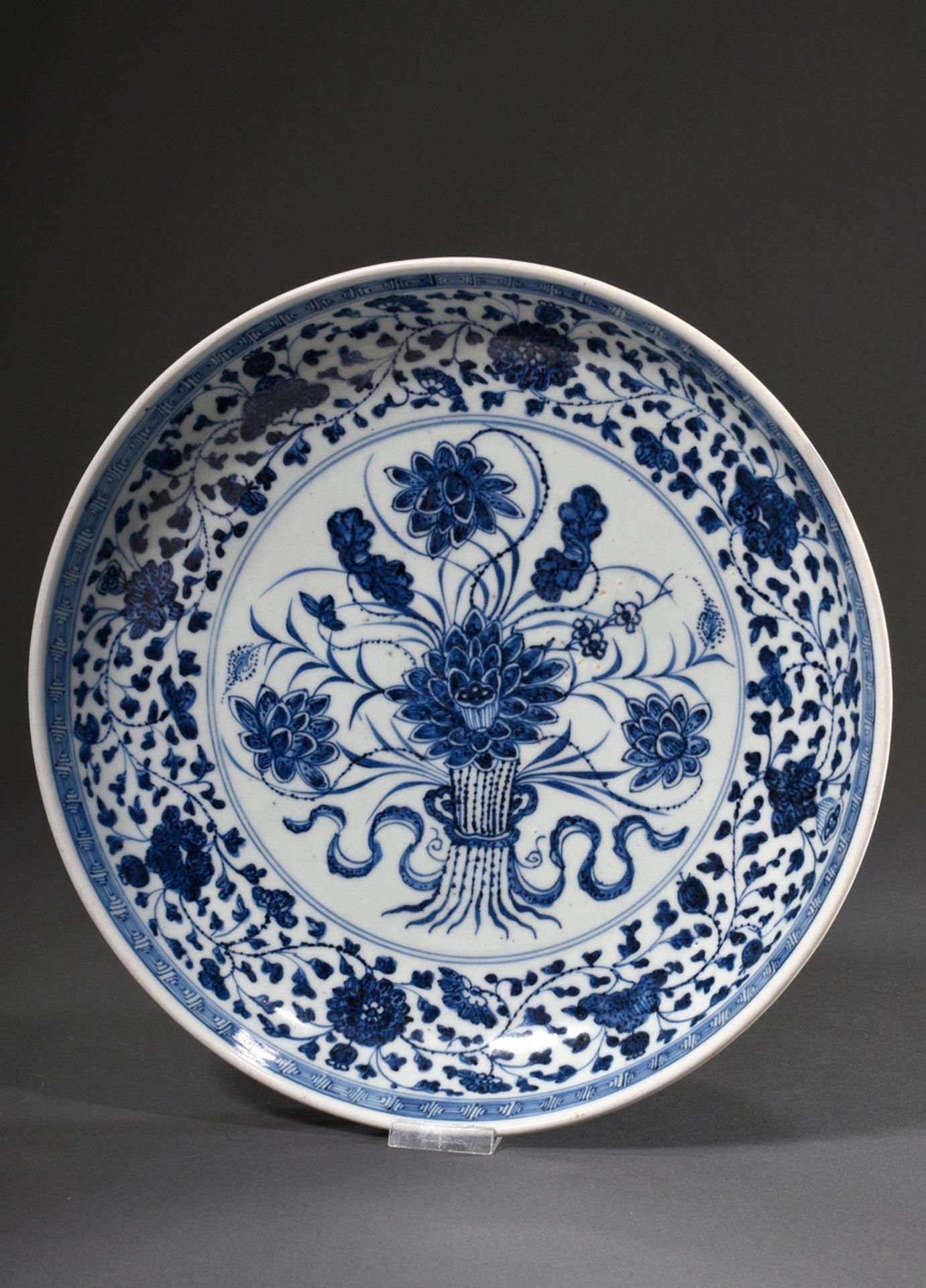 Large bowl in Ming style with blue painting decoration "Lotus blossoms" with meander band, probably