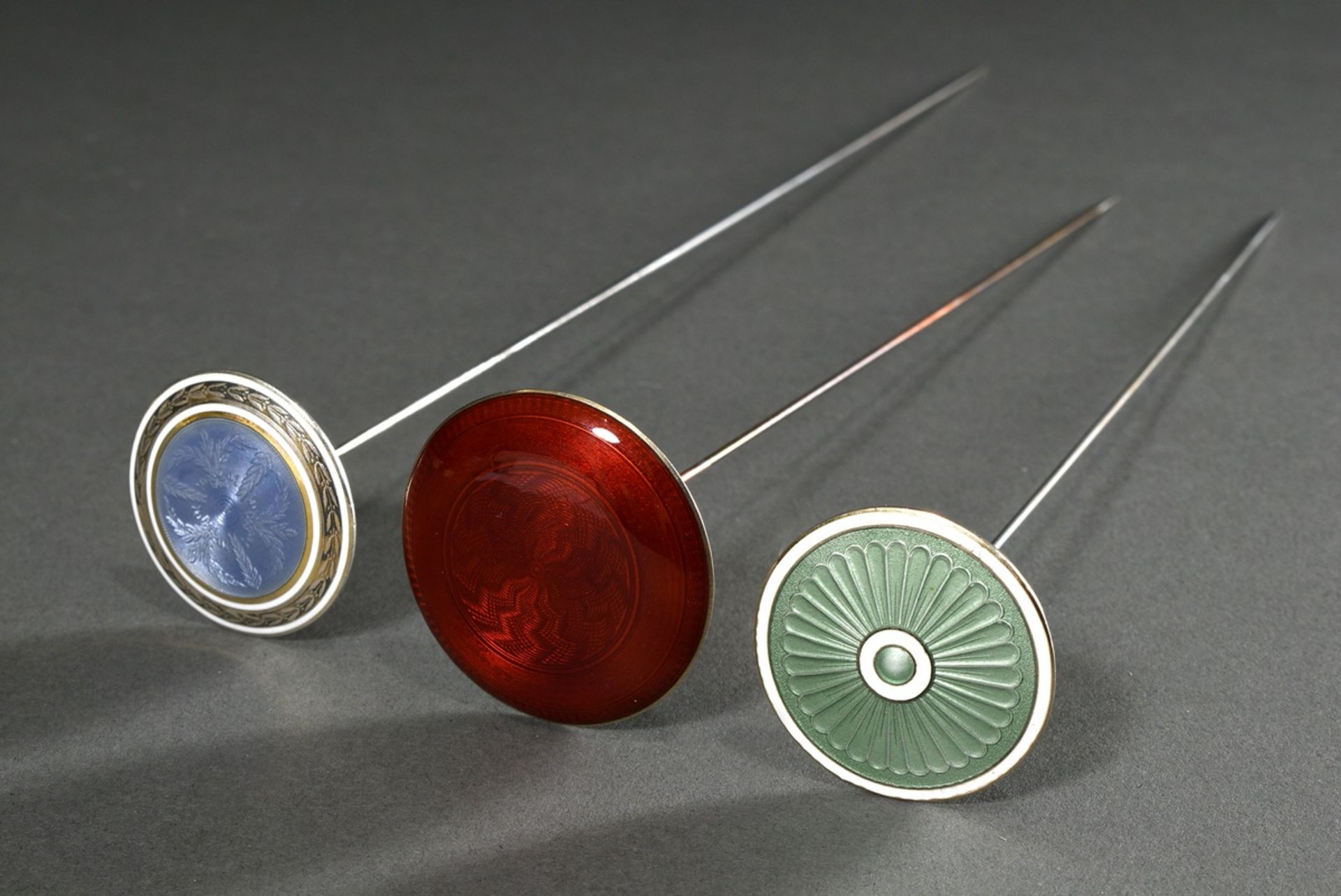 3 Various hat pins with coloured guilloché enamel heads, around 1900, 1x MM: David Andersen/Norway,