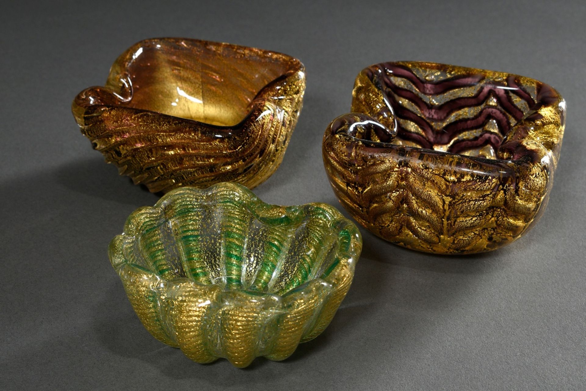 3 Various Barovier & Toso Murano ashtrays in organic form, mouth blown colorless glass with partly 
