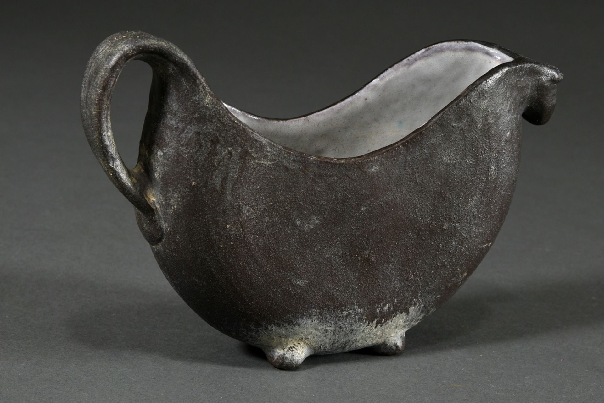 Maetzel, Monika (1917-2010) studio pottery vessel in animal shape with handle, reddish body black/l - Image 2 of 3