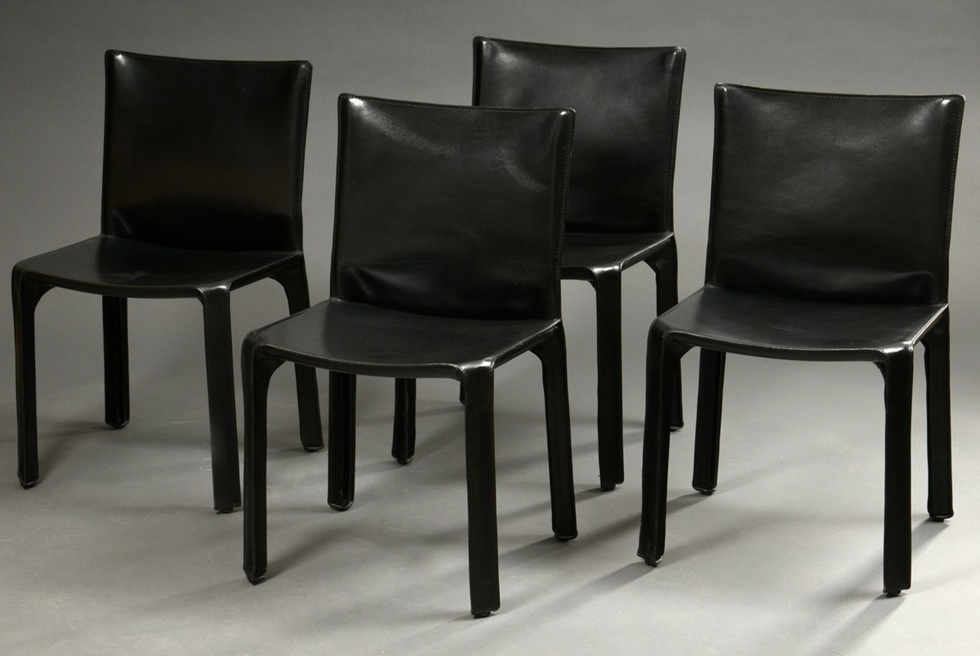 4 Cassina CAB 412 chairs, lacquered steel frame with black core leather upholstery, designed by Mar