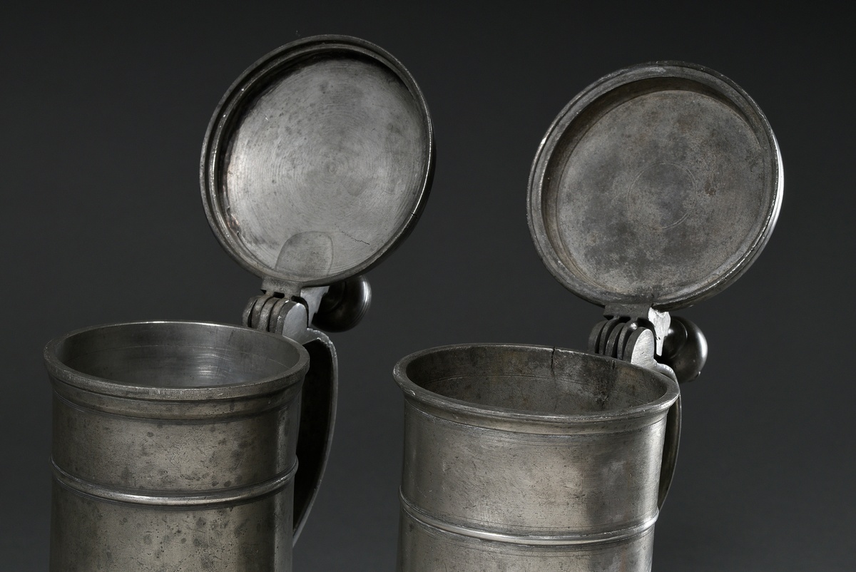 2 Diverse Lübeck pewter pillar jugs or tap seats with spherical thumb rest, ornamental relief on th - Image 3 of 8