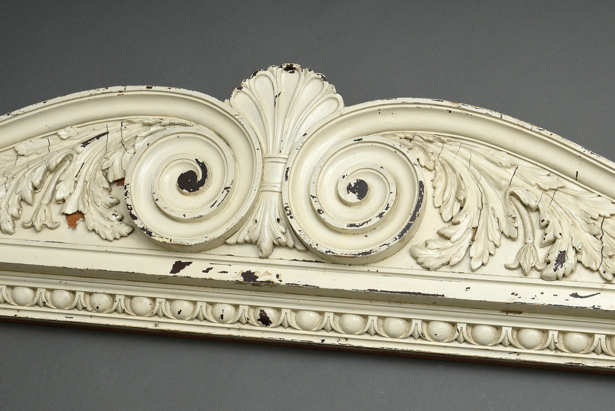 Carved supraport with acanthus leaves, volutes and egg-bar frieze, wood painted white, 39x214x15cm,