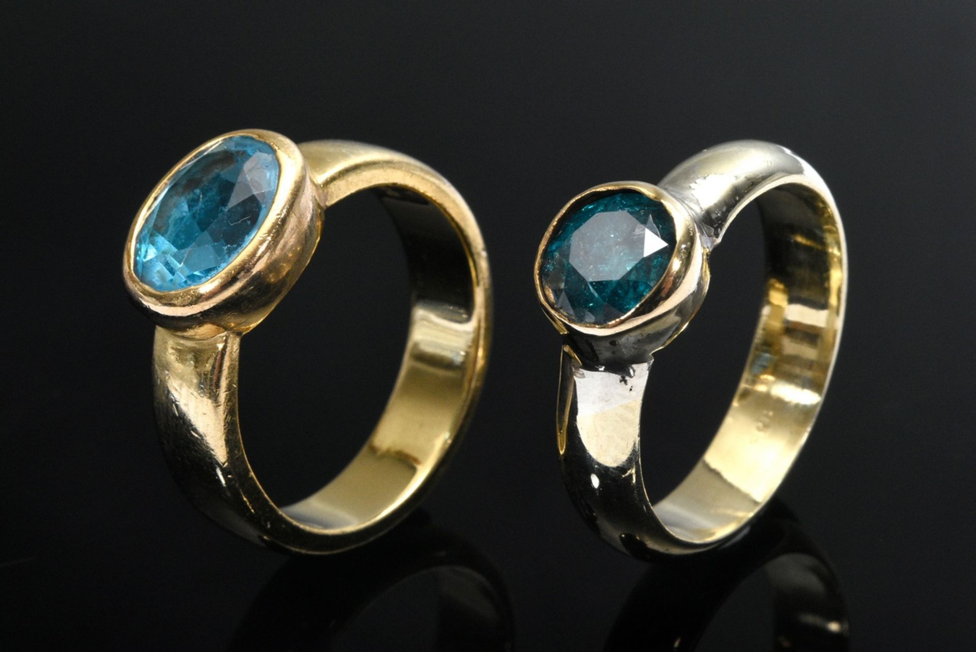 2 Diverse moderne Bandringe: Gelbgold 750 mit blauem Topas (10,3g, Gr.56 ) und Gelbgold 585 mit Zir