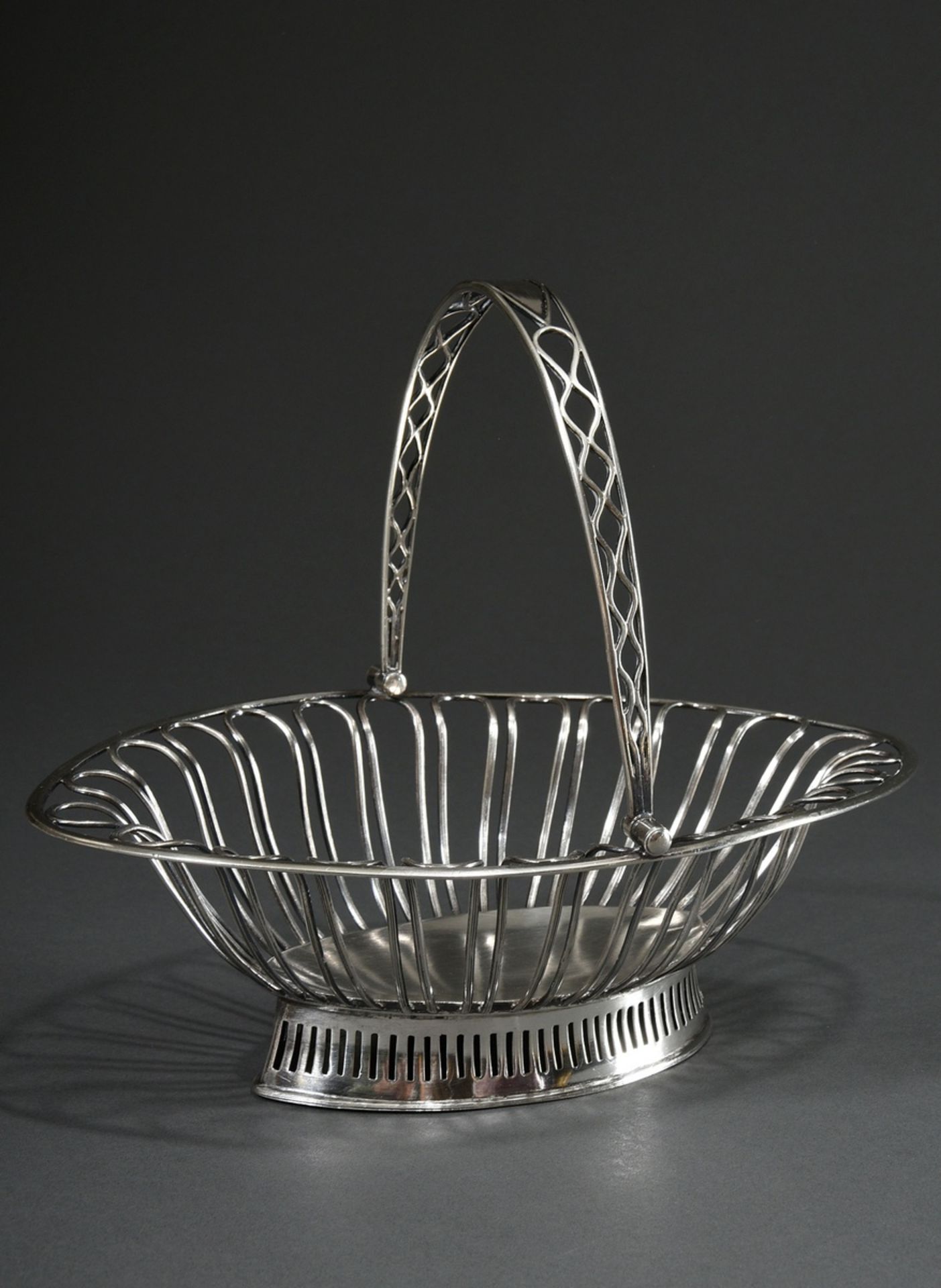 Classic silver basket with openwork hinged handle in simple façon, early 19th century, MM: B in dou