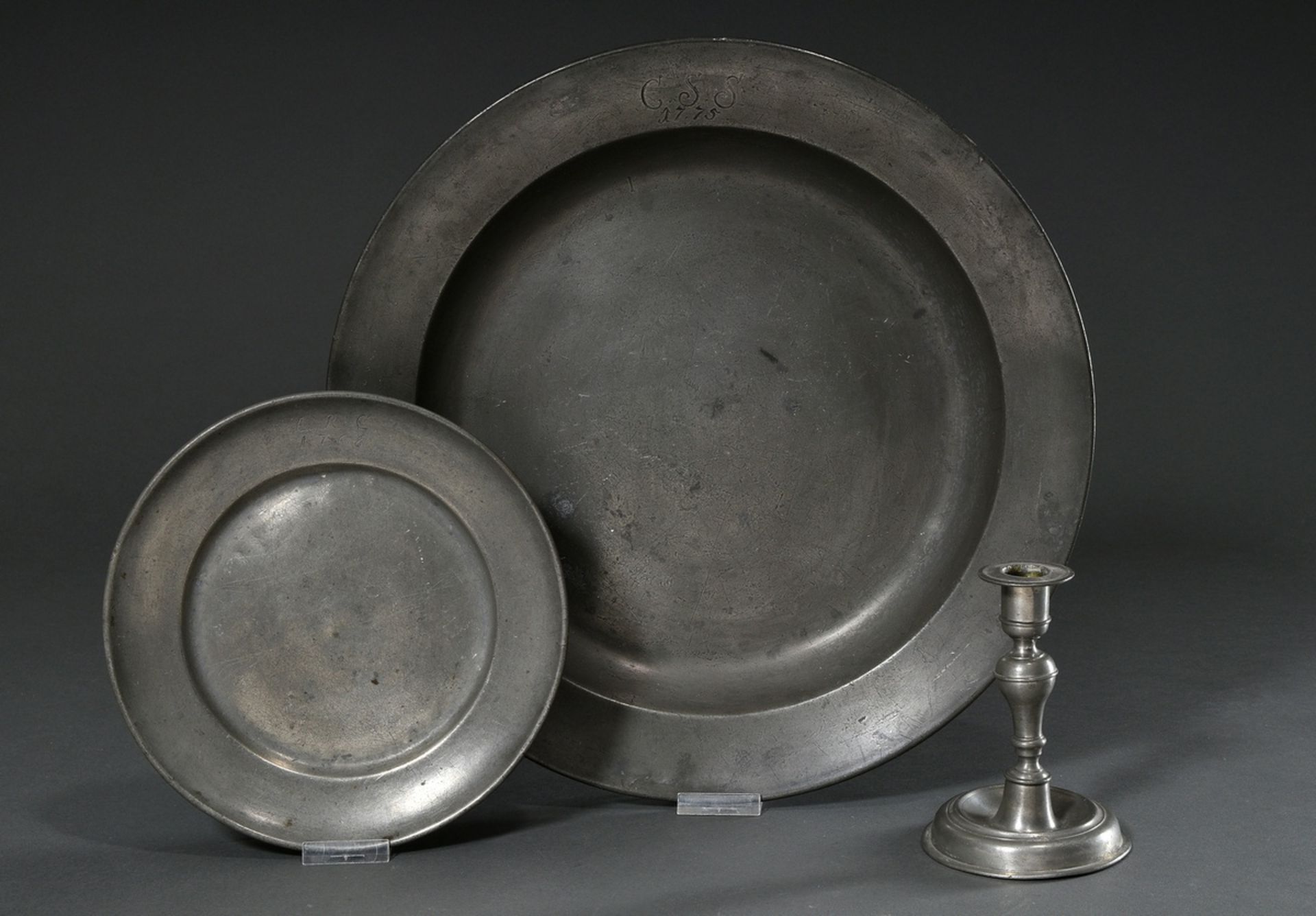 3 Various pieces of pewter, 18th century: large plate with engraved owner's monogram "C.S.S. 1775",