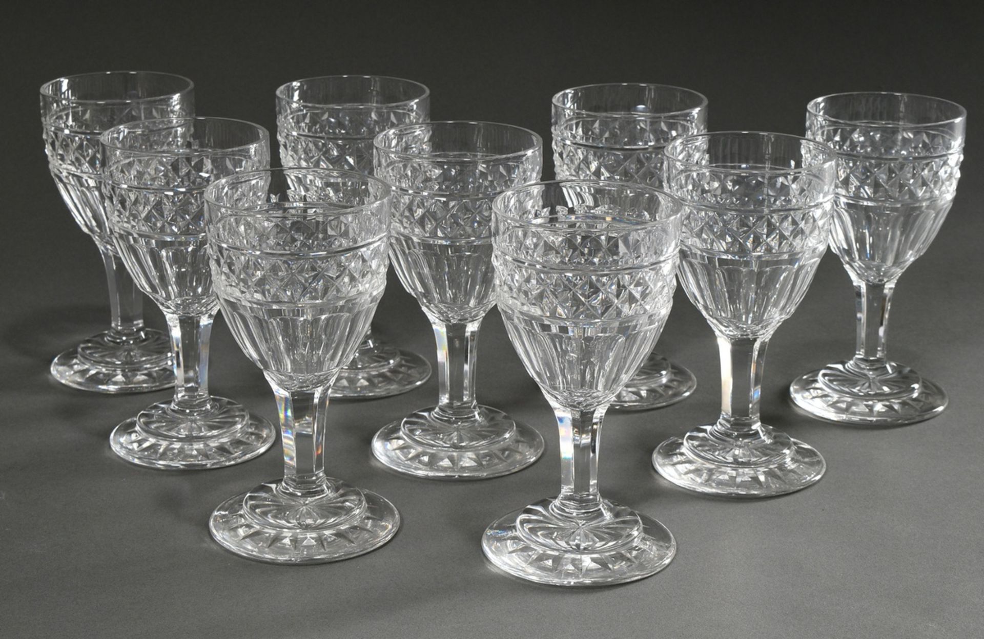 9 Heavy crystal red wine glasses with steinel and surface cut and star in the foot, c. 1900, h. 16,