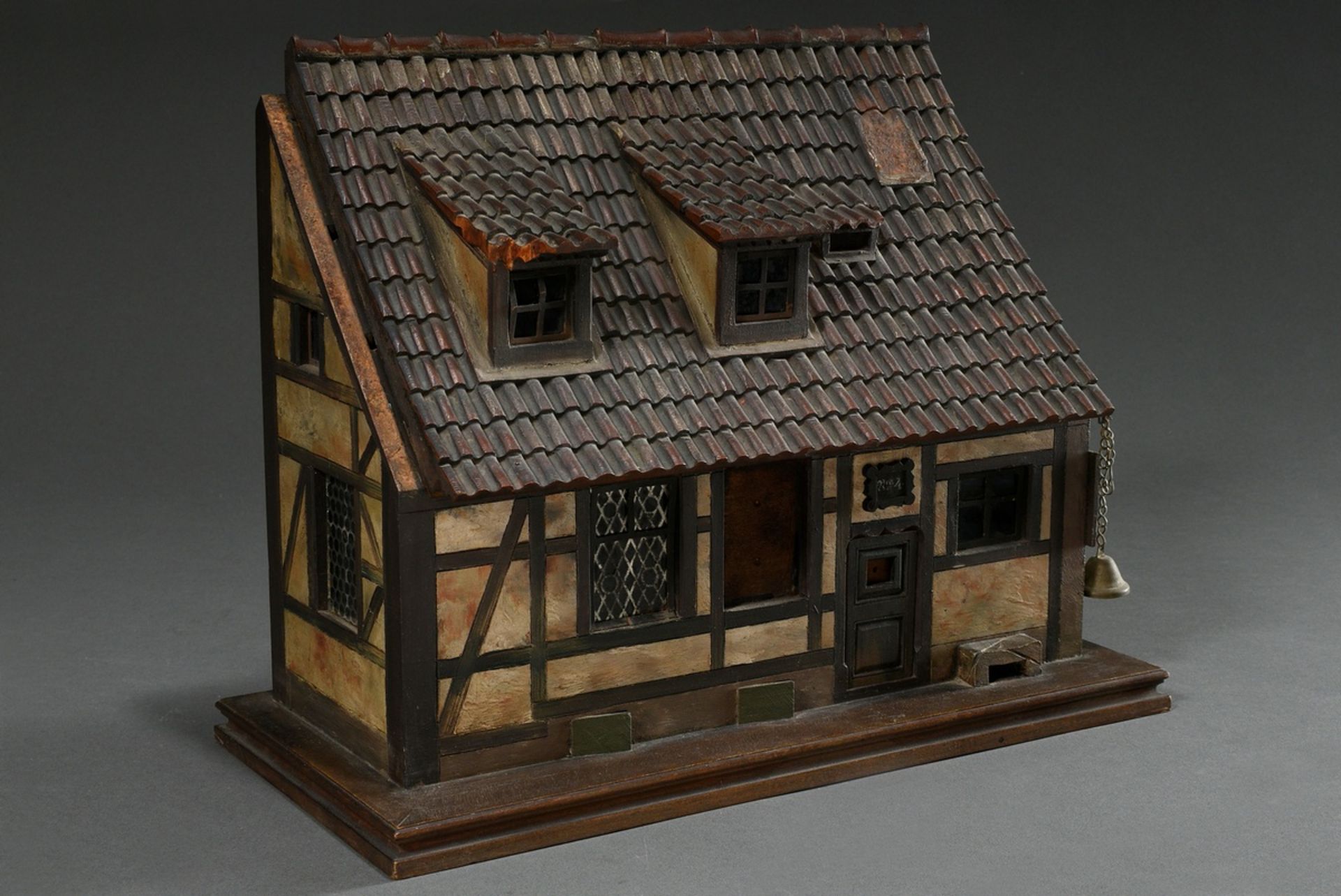 Historicist standing collector or correspondence rack in the shape of an old German house with fold