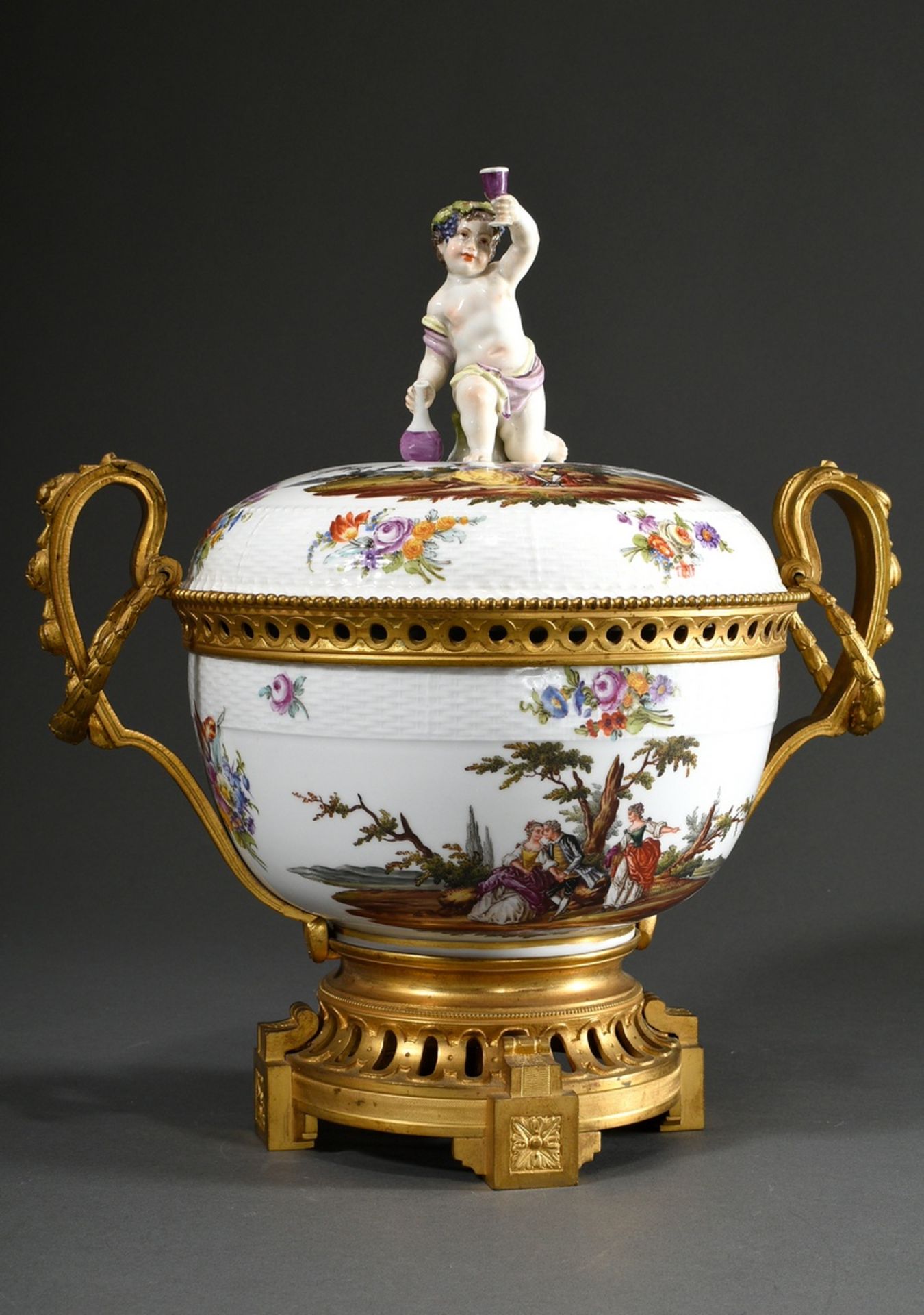 Large KPM lidded tureen of spherical form with figural knob "Bacchus boy with raised glass", the wa