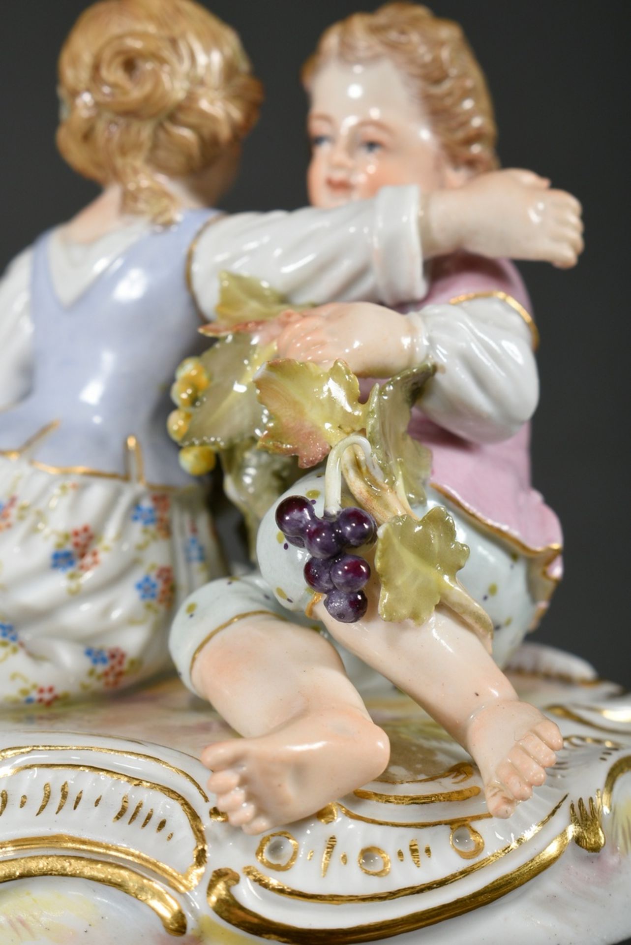 Small Meissen group "Two Children with Grapes", a boy and a girl sitting on an oval rocaille base f - Image 7 of 7