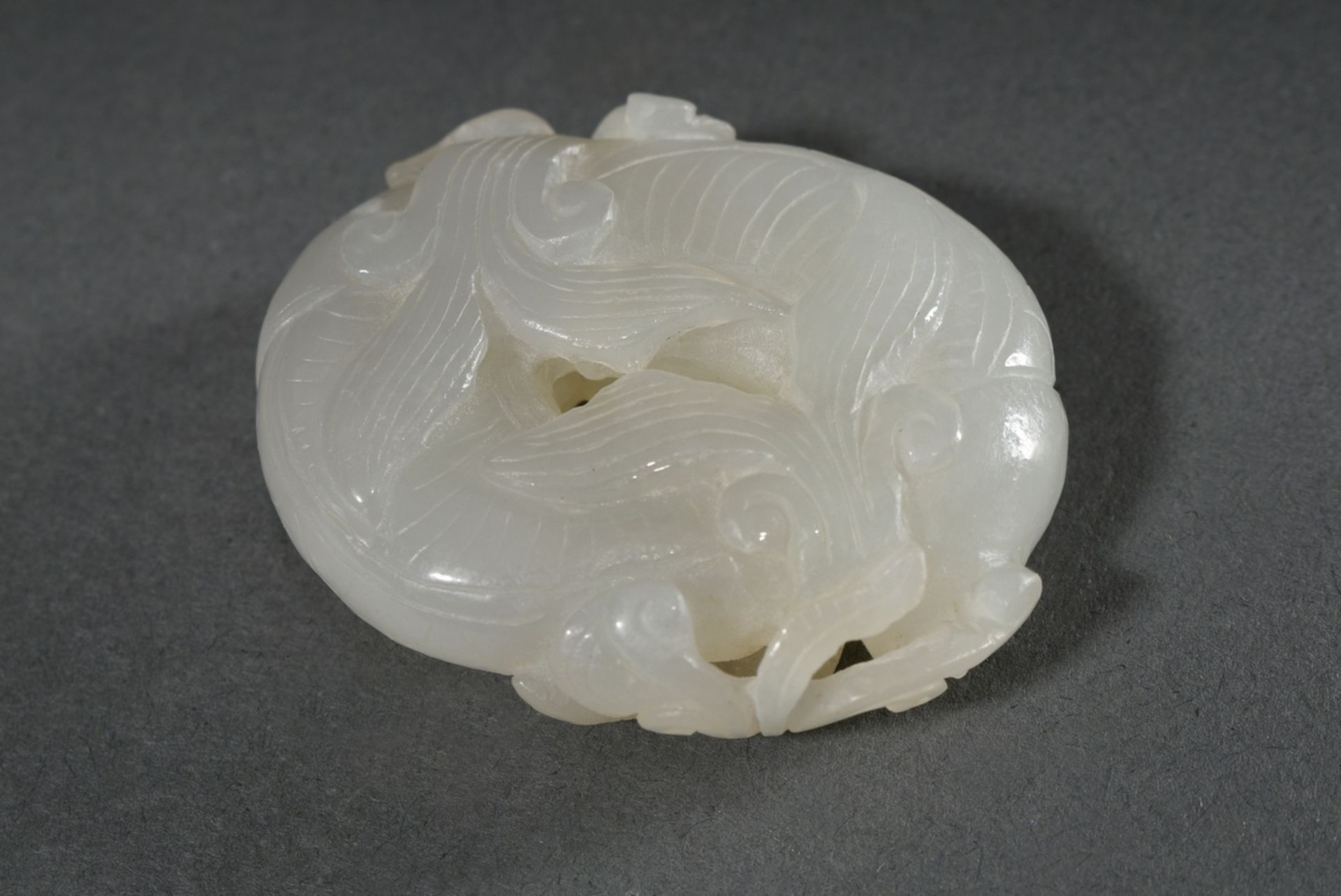 Fine light jade toggle "Two catfish and plants", China, Qing period, wooden stand, 5.3x4.2x1.5cm - Image 3 of 4