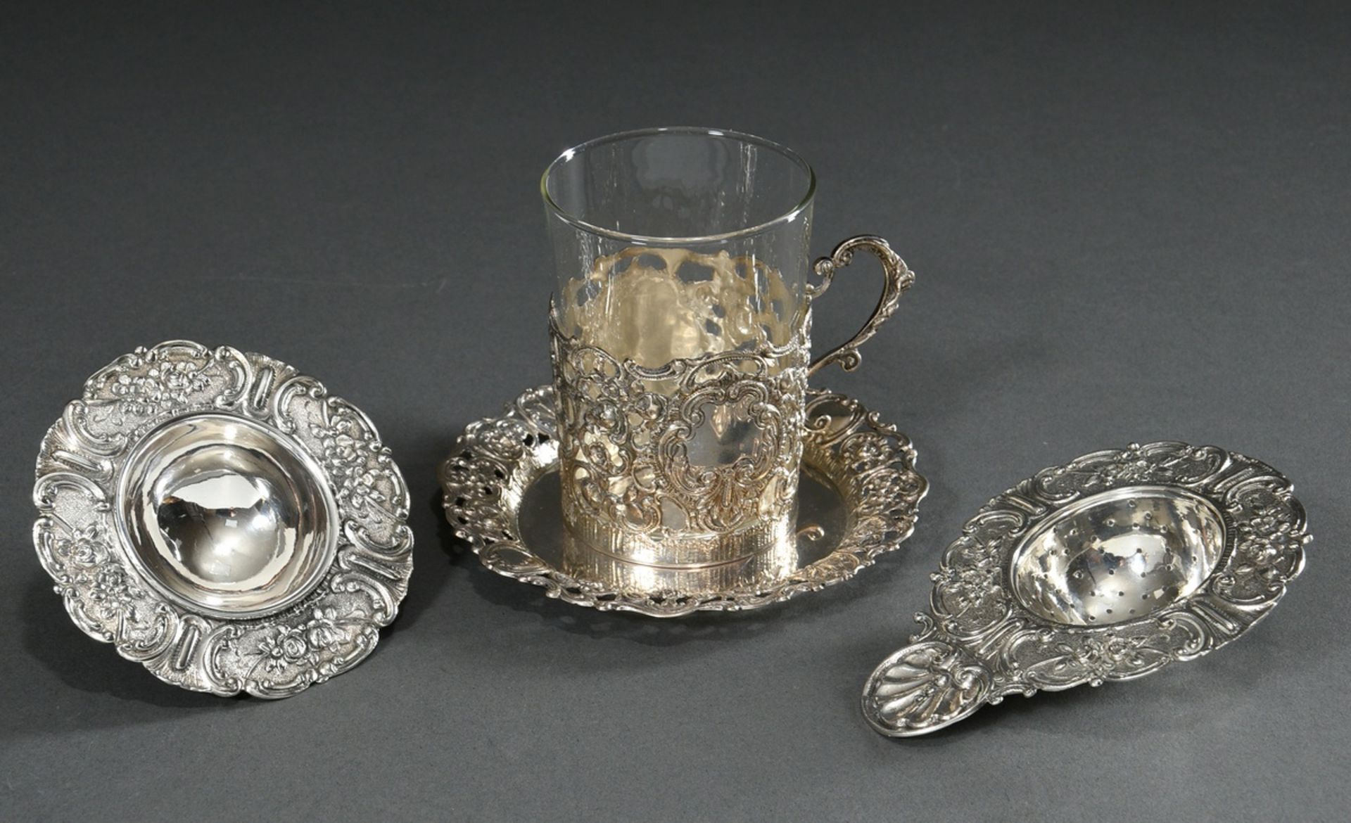 2 pieces richly reliefed tea glass on saucer and tea strainer on saucer "Roses and Rocailles", Germ - Image 2 of 7