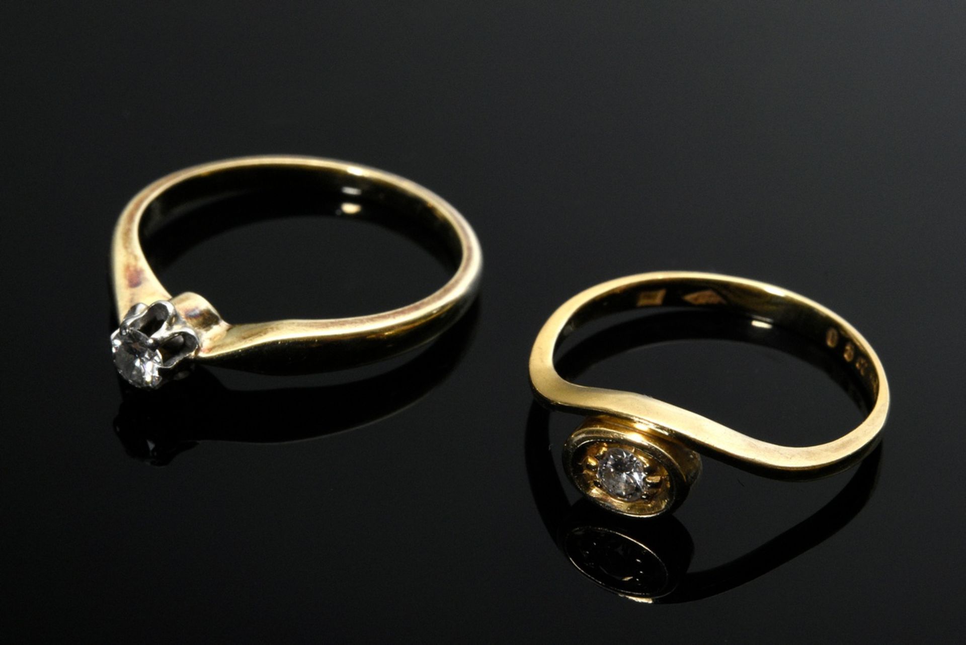 2 Diverse Ringe: Gelbgold 750 mit Brillant (ca. 0.07ct/VSI/W, 1,4g, Gr. 50) und Gelbgold 585 mit Br