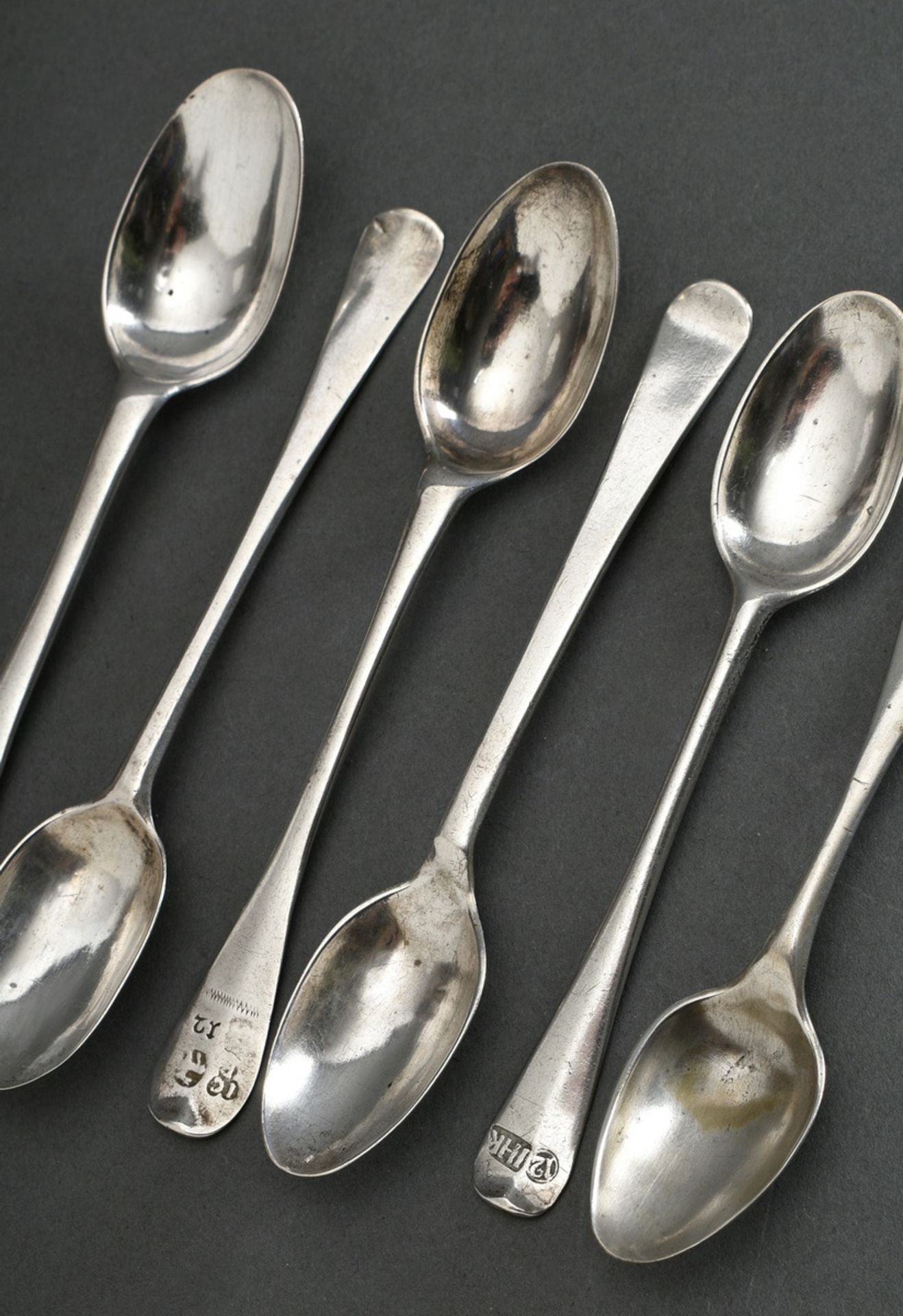 6 Various plain teaspoons after the English "Hanoverian" model, some with engraved owner's monogram