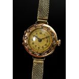 Gelbgold 585 Armbanduhr mit Diamantlunette (zus. ca. 0.24ct/SI-P2/TCR-B, 1x Imitatstein), Schweiz u