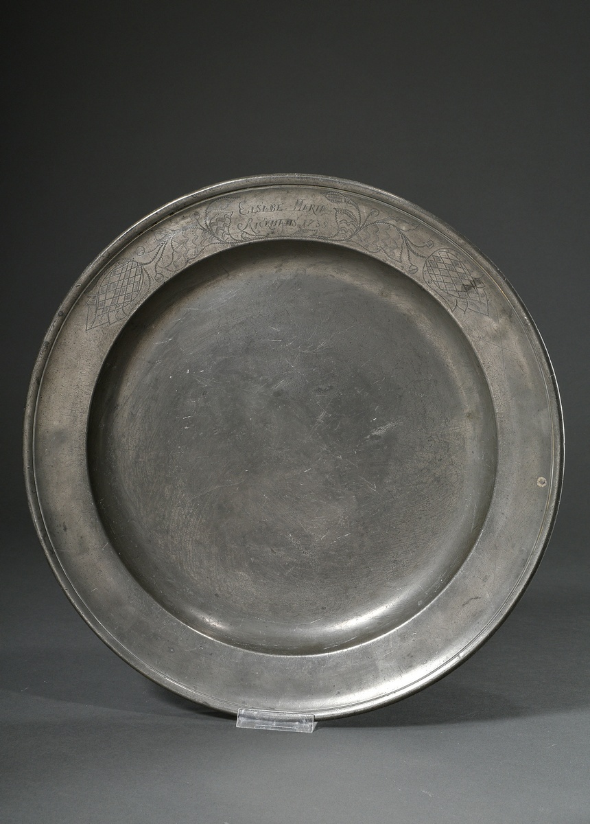 Large North German pewter plate from the estate of Elsabe Maria Rickmans with floral engraving and