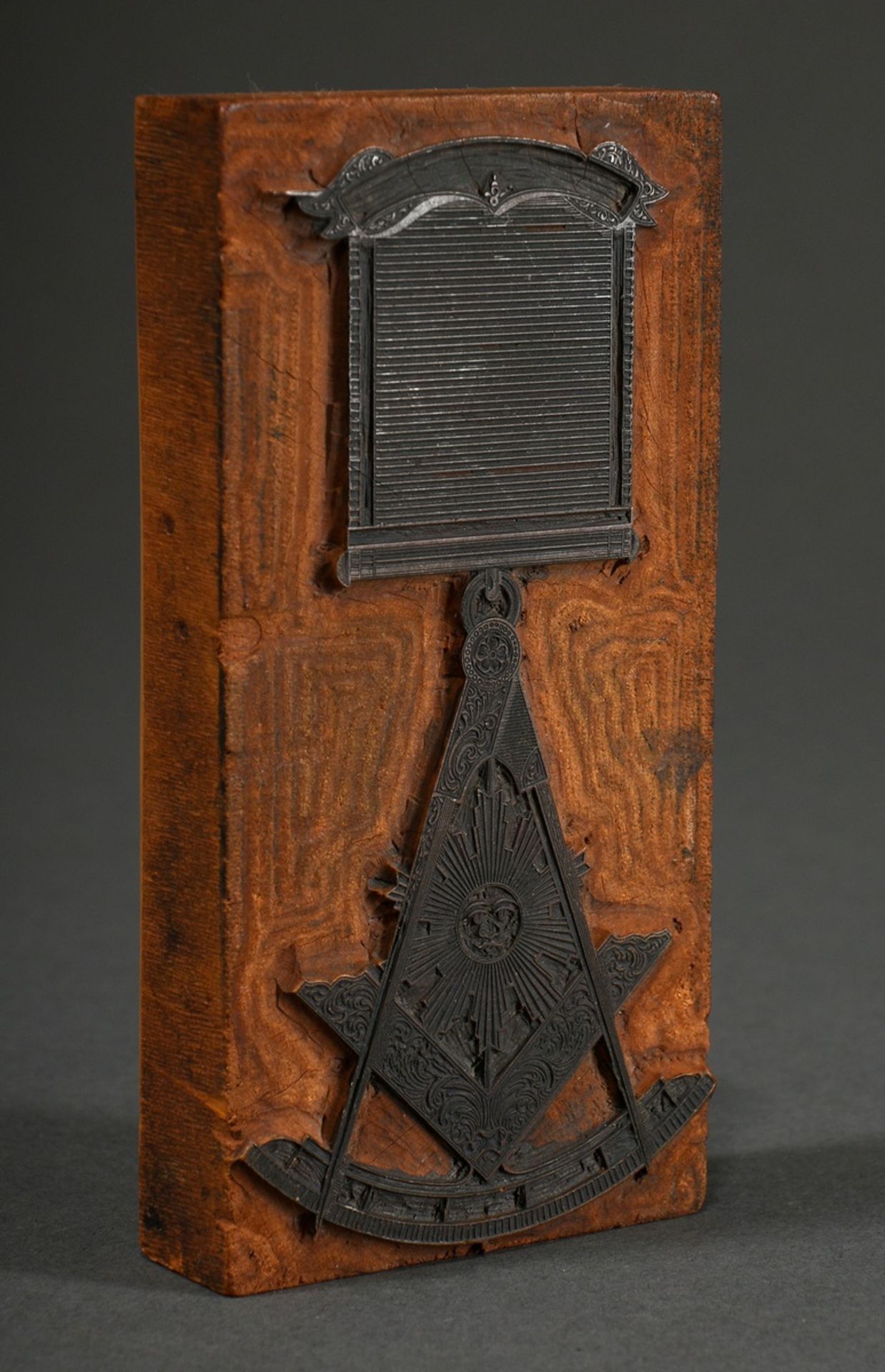 Freemason's stamp with finely deep-engraved metal "compass, angle, sun" on a light wooden corpus, 1