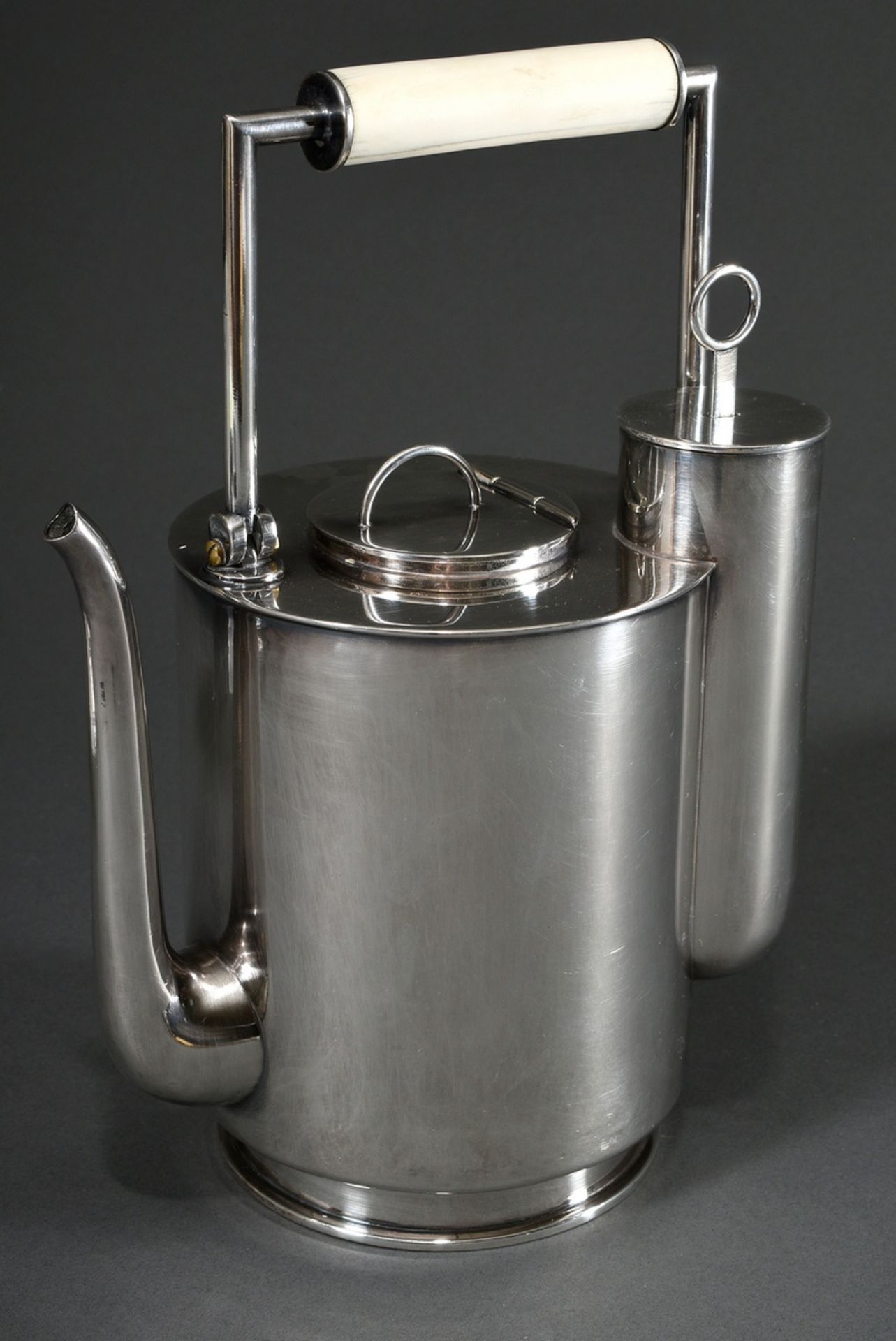 Cylindrical Bauhaus pot with low spout and integrated tea-egg in attached cylinder, hinged lid and