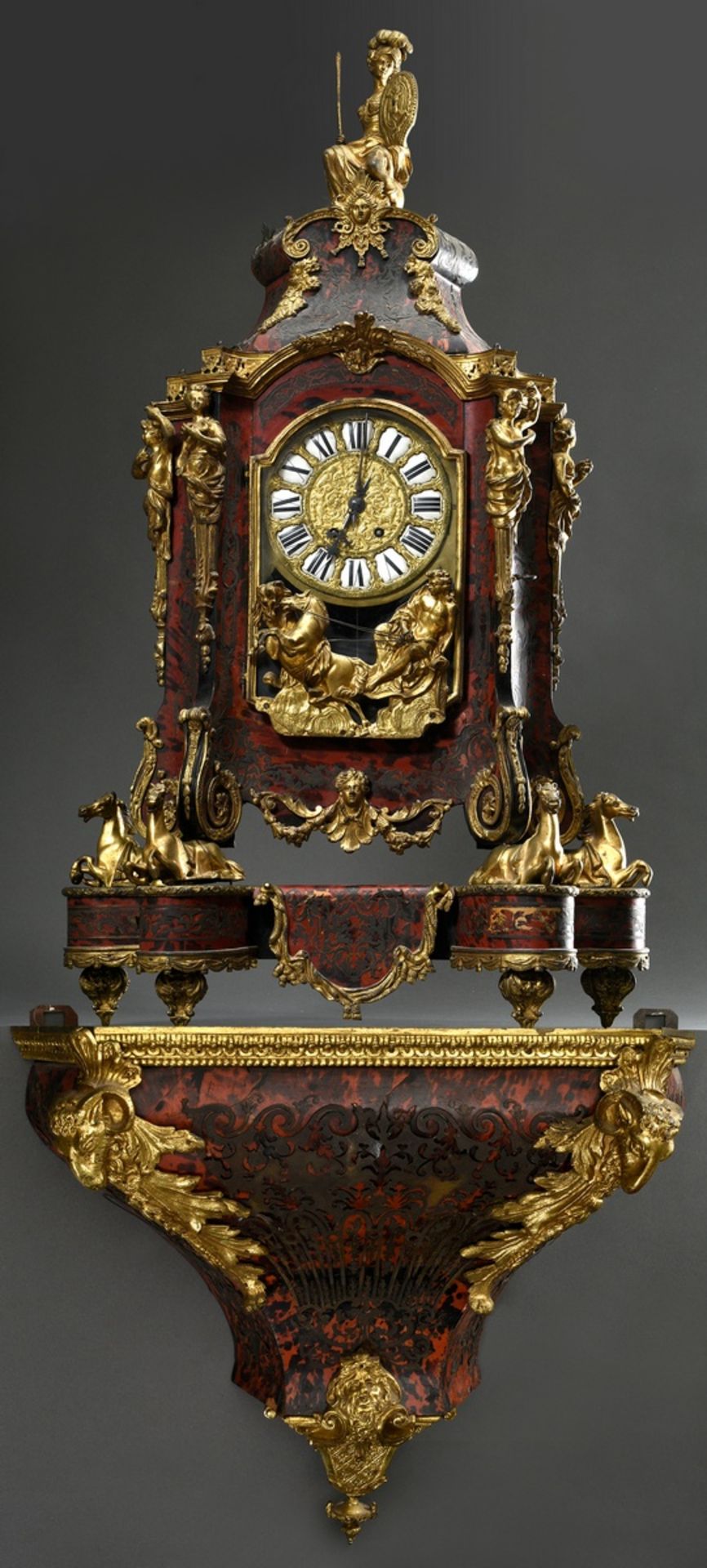 Large Boulle state pendulum with fire-gilded bronzes on wall console in Louis XVI style, red-brown